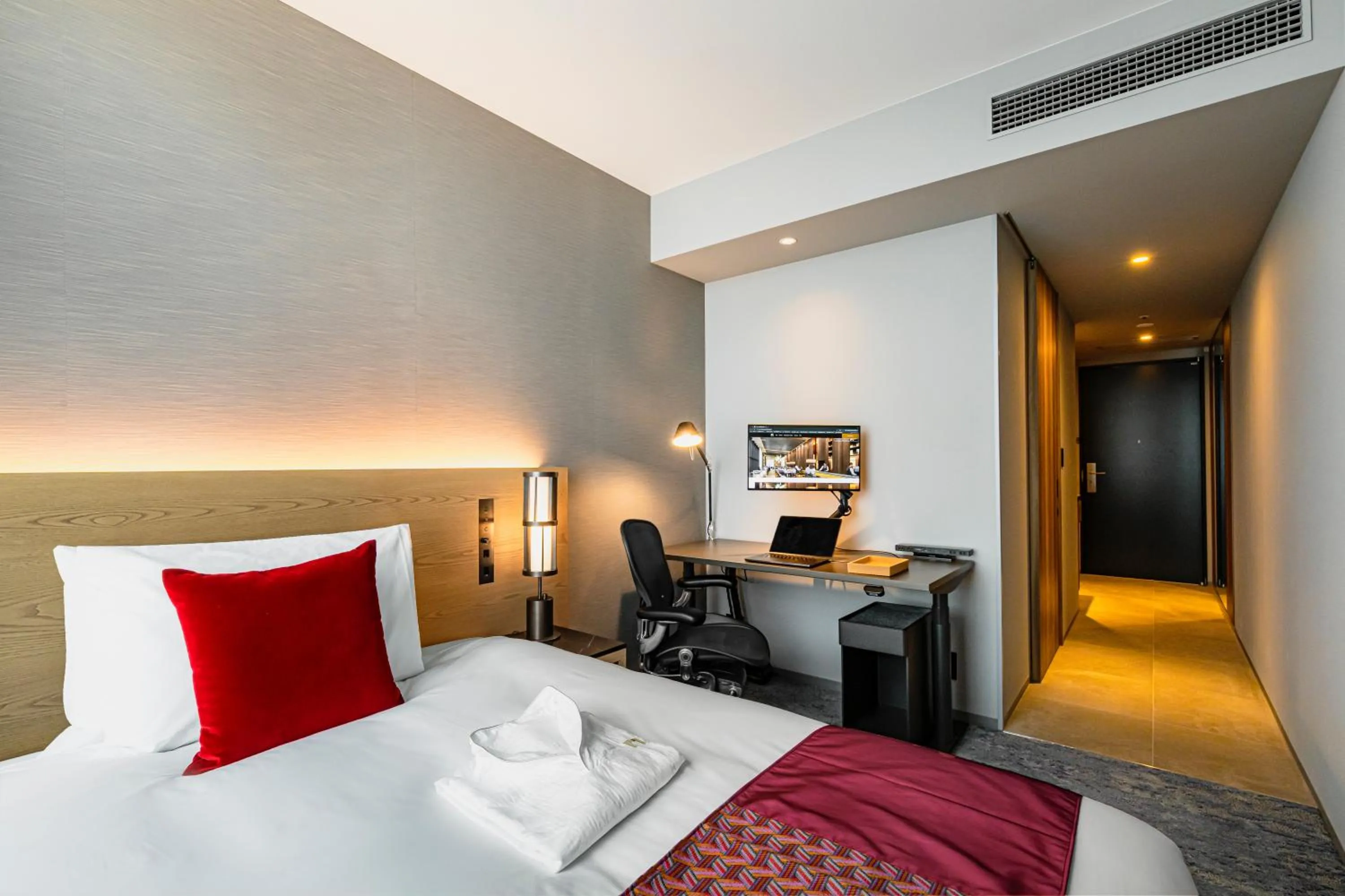 Bed in The Gate Hotel Fukuoka by Hulic