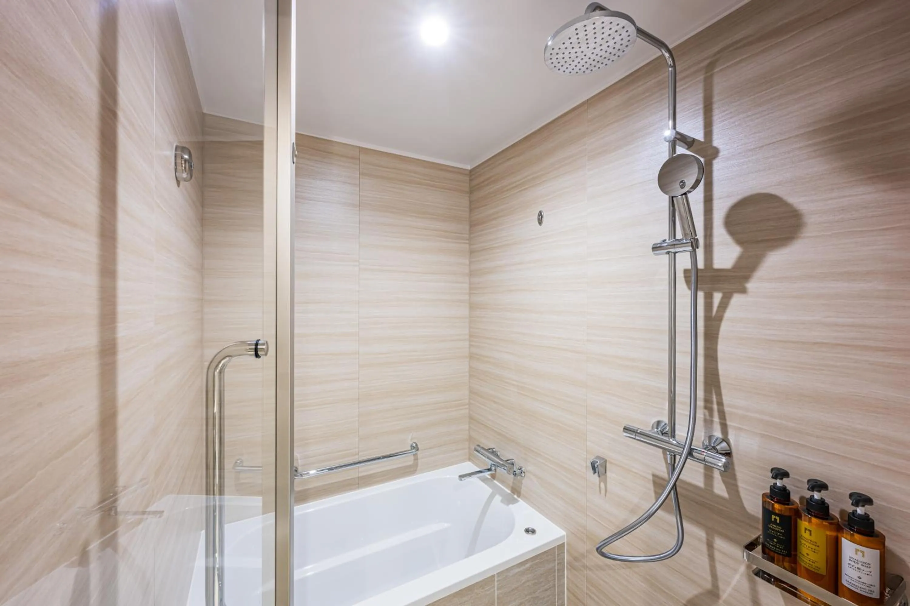 Bathroom in The Gate Hotel Fukuoka by Hulic