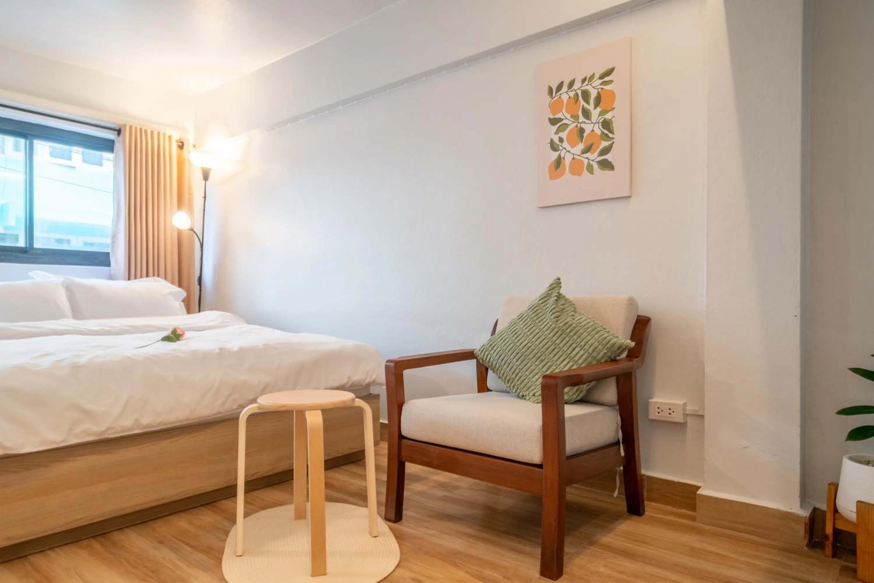 Seating area, Bed in Cozy Corner Bangpho