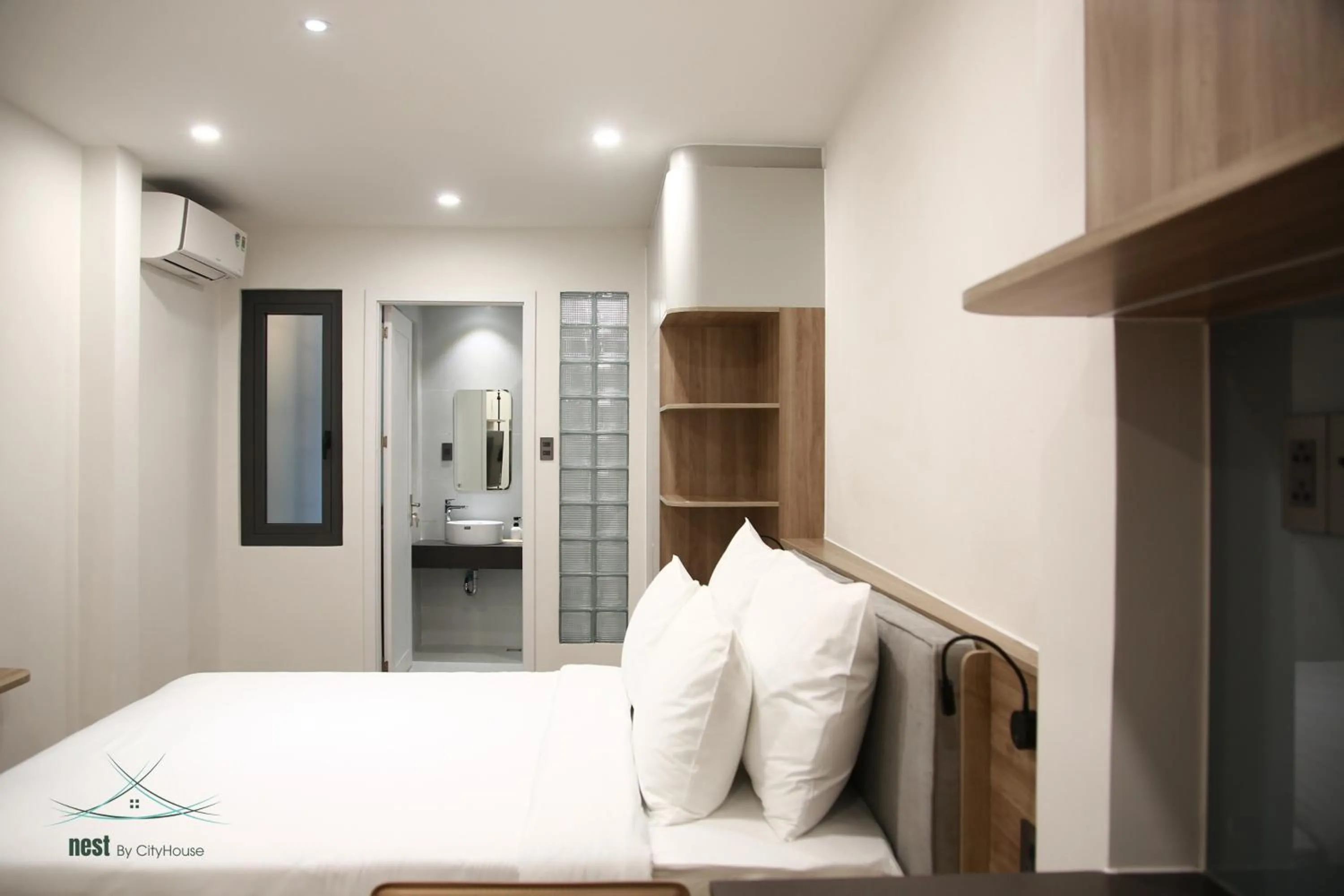 Photo of the whole room, Bed in Cityhouse - Nest Minh Khai