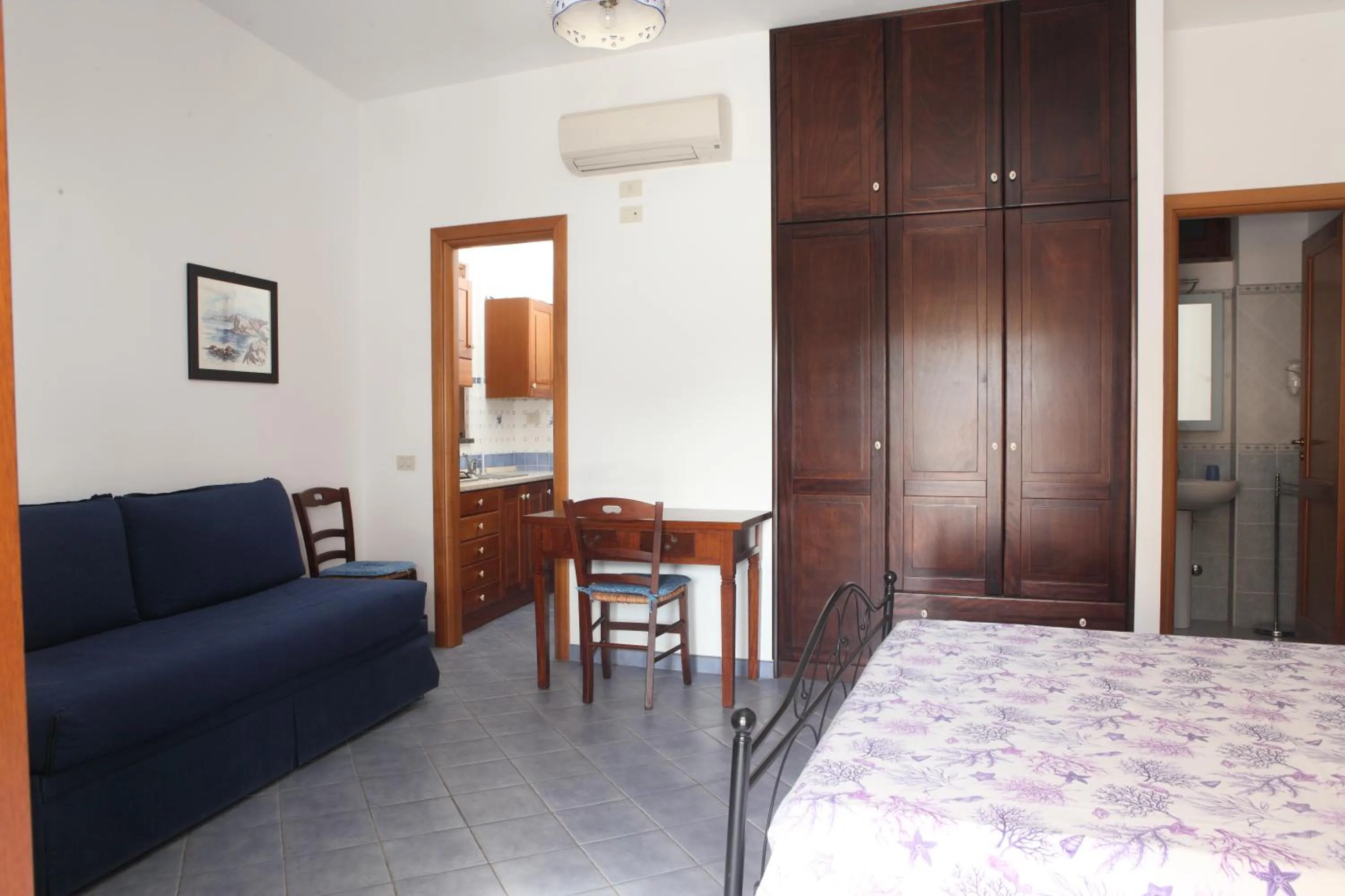 Living room, Bed in Hotel Residence La Villetta