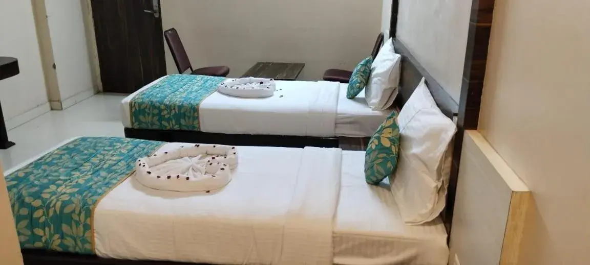 Bed in Hotel Shashinag Residency Bed in Hotel Shashinag Residency