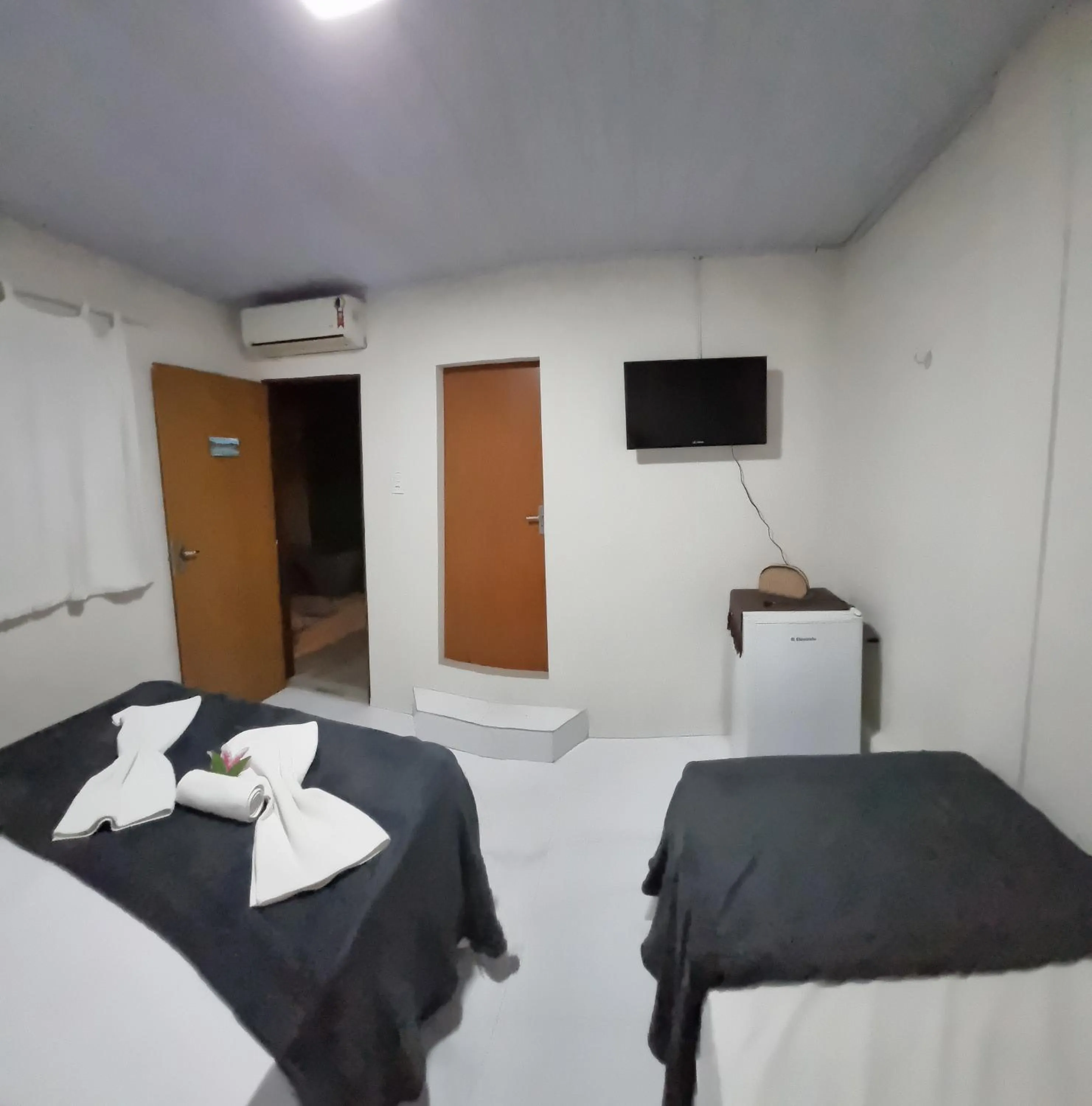 Bed in Pousada Mar e Sol