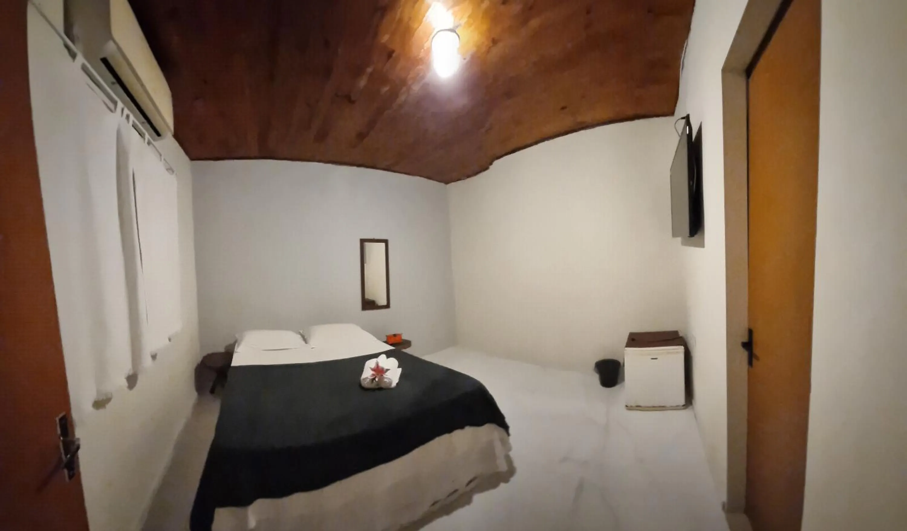 Bed in Pousada Mar e Sol