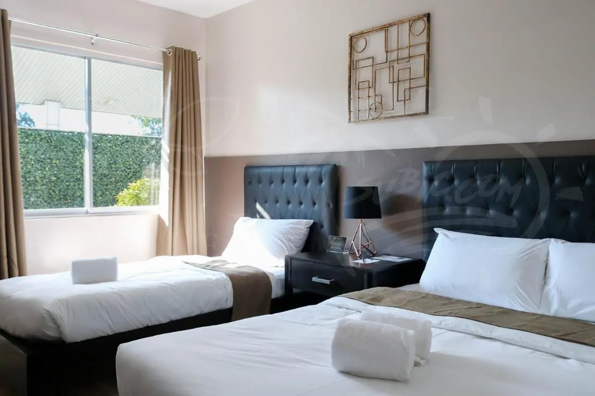 Bed in Bumble V Subic Hotel