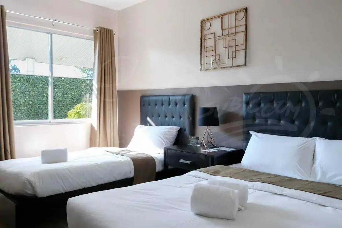 Bed in Bumble V Subic Hotel Bed in Bumble V Subic Hotel