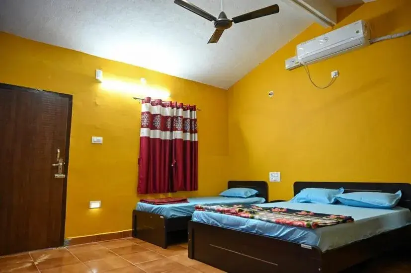 Bed in The Shadaxari Nilaya Bed in The Shadaxari Nilaya