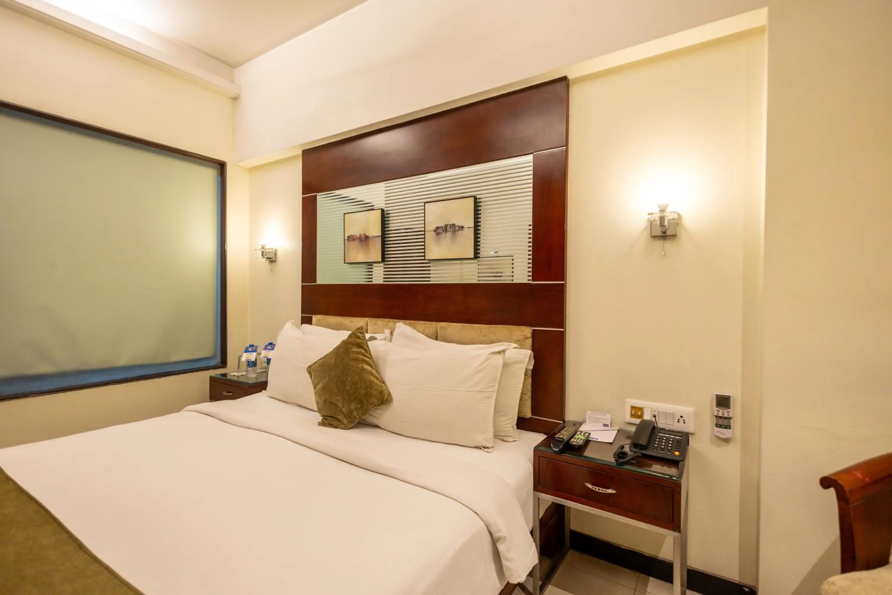 Bed in Kyriad Hotel Indore by OTHPL