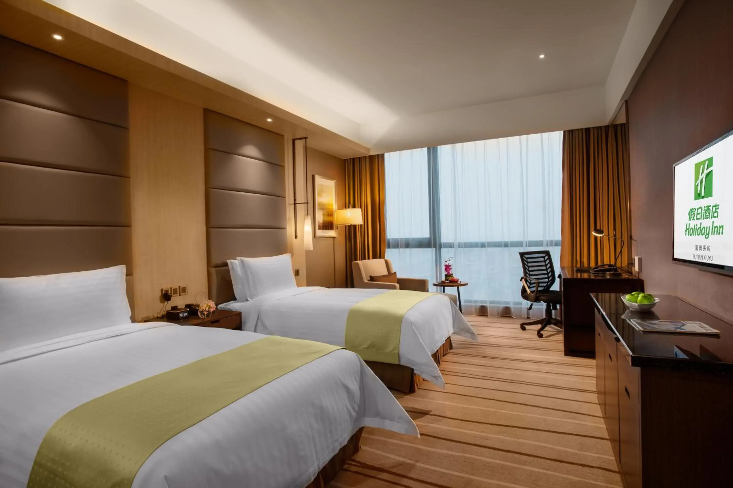 Bed in Holiday Inn Putian Xiuyu by IHG Bed in Holiday Inn Putian Xiuyu by IHG