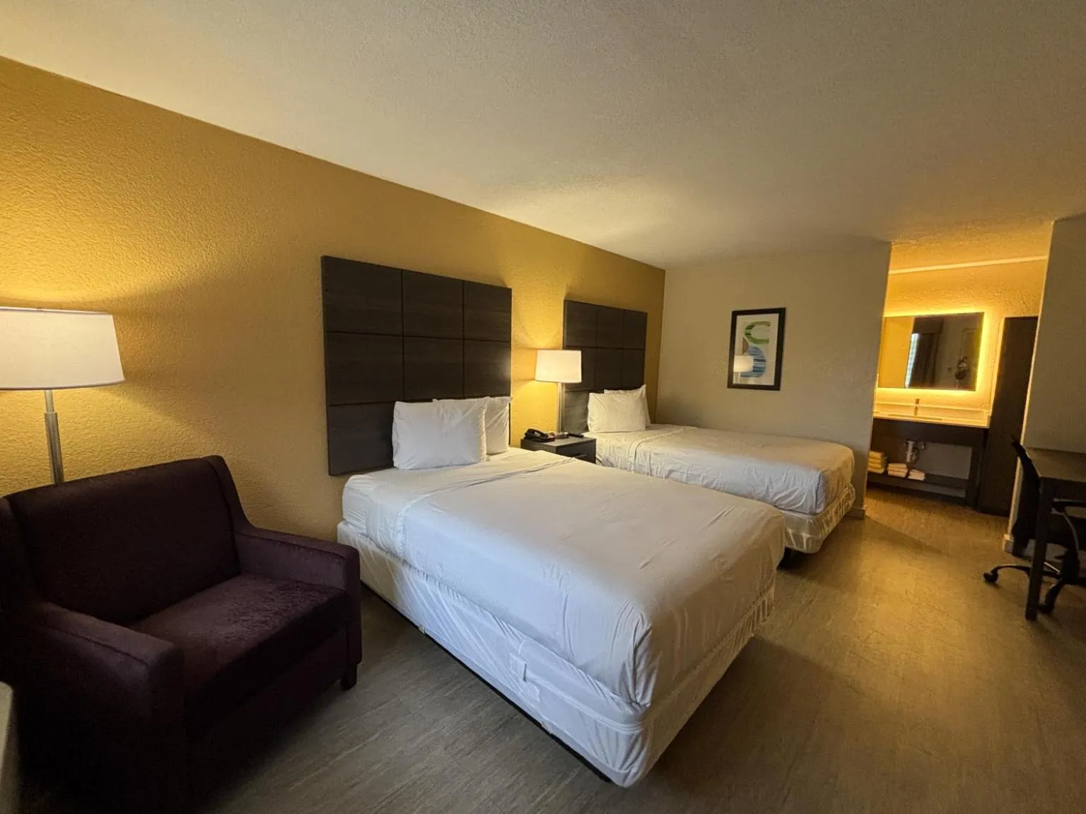 Photo of the whole room, Bed in Studio 6 Suites Charlotte, NC Northlake