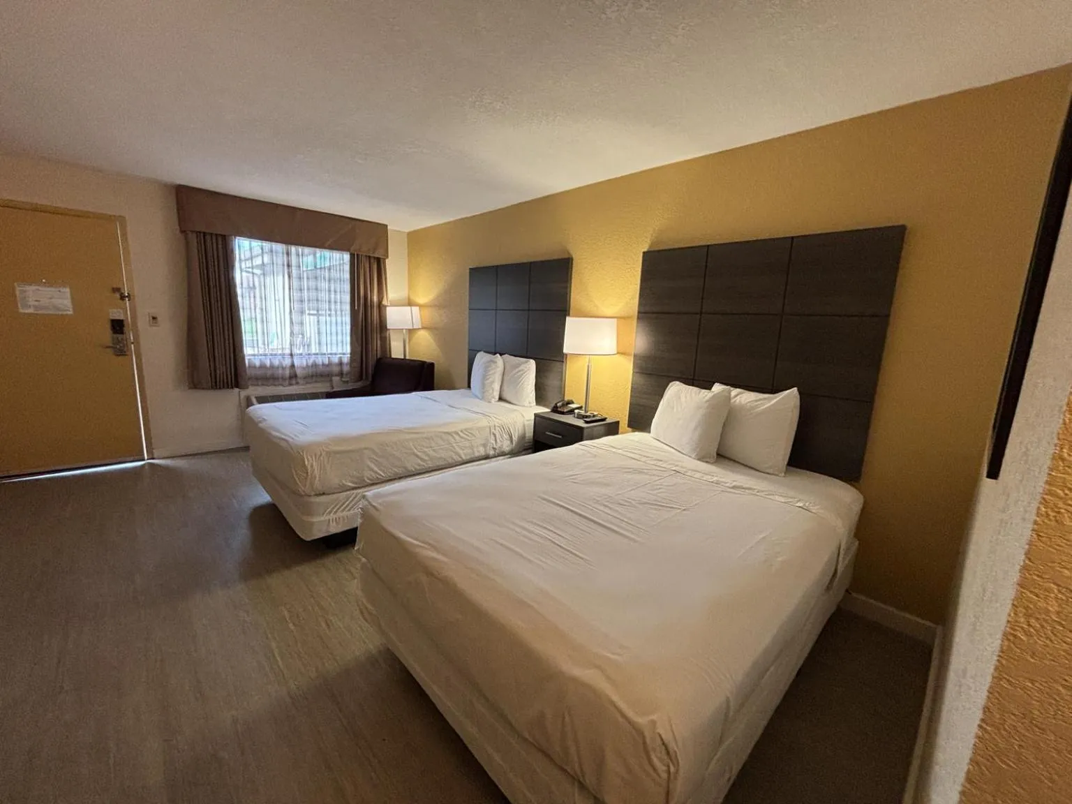 Photo of the whole room, Bed in Studio 6 Suites Charlotte, NC Northlake