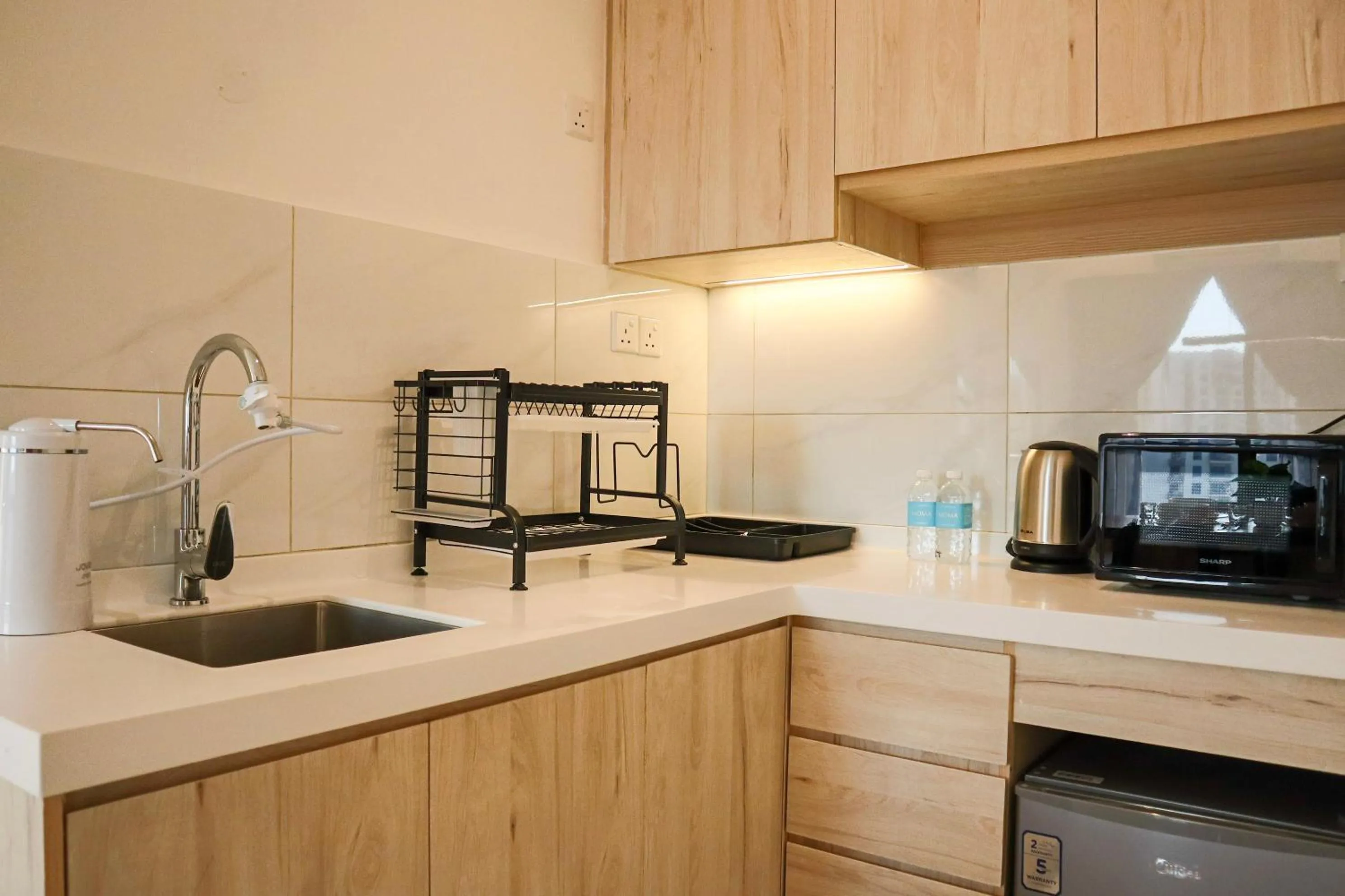 Kitchen or kitchenette in The SIGAR Hotel at Sutera Bay