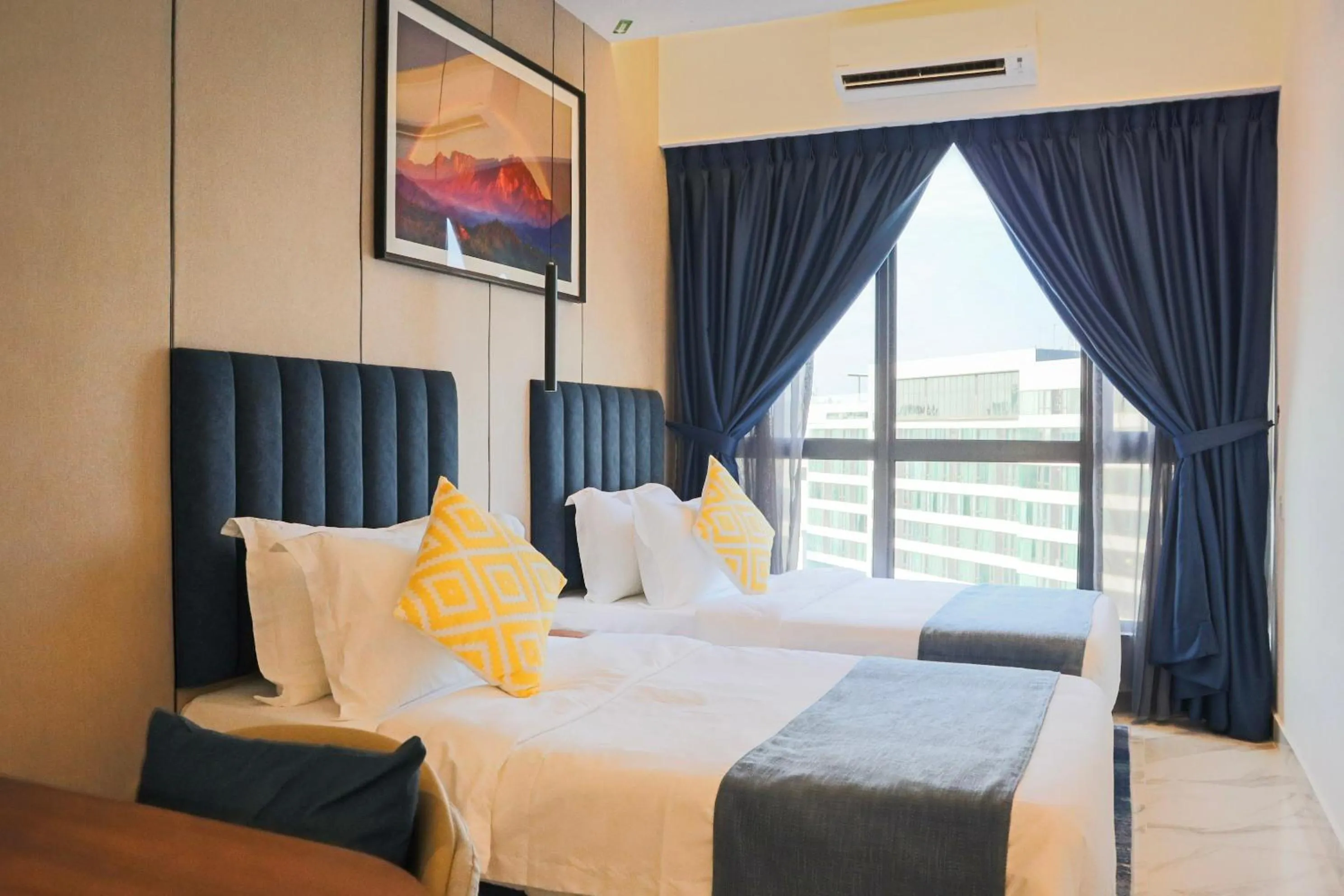 Bed in The SIGAR Hotel at Sutera Bay