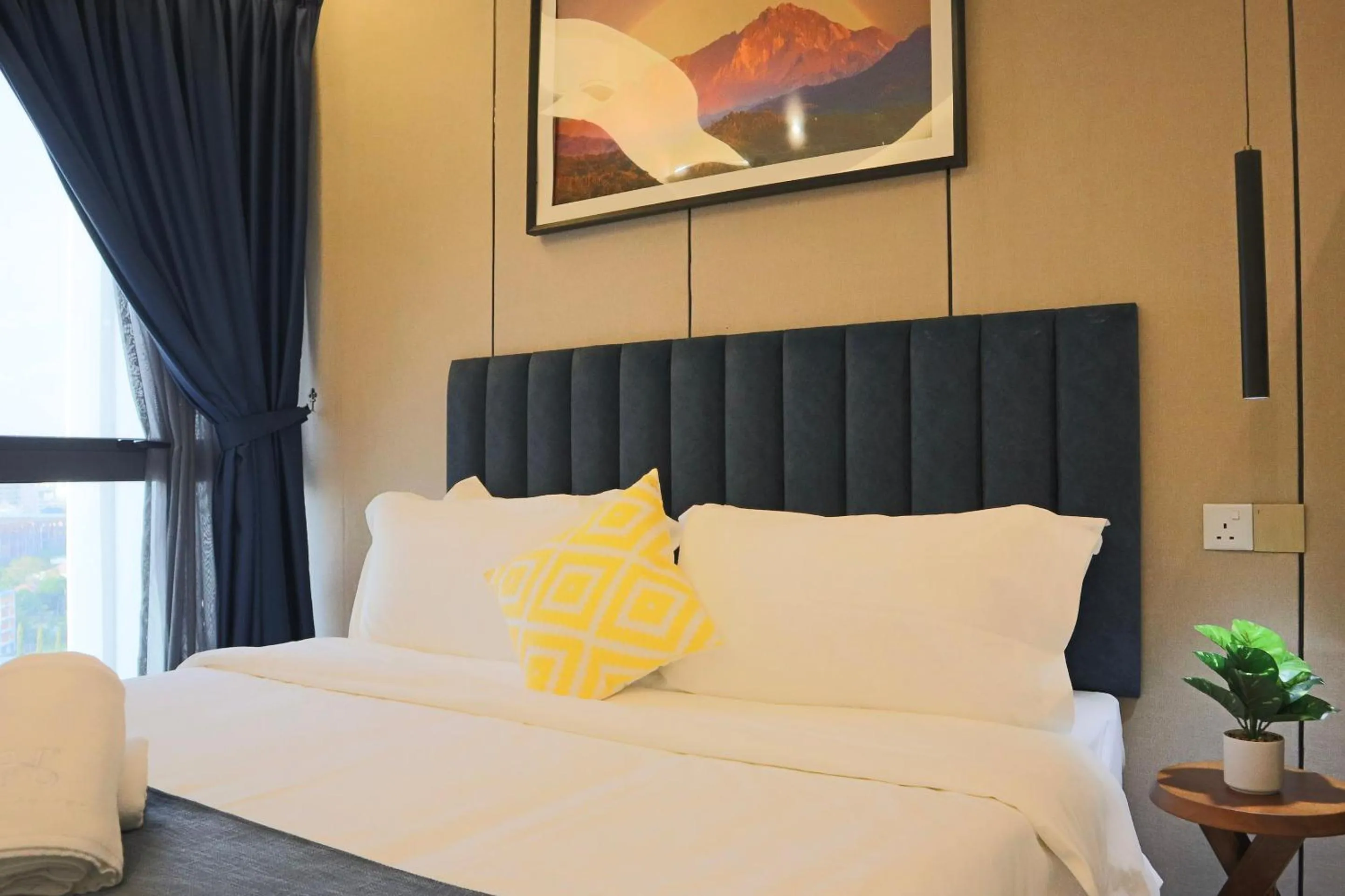 Bed in The SIGAR Hotel at Sutera Bay