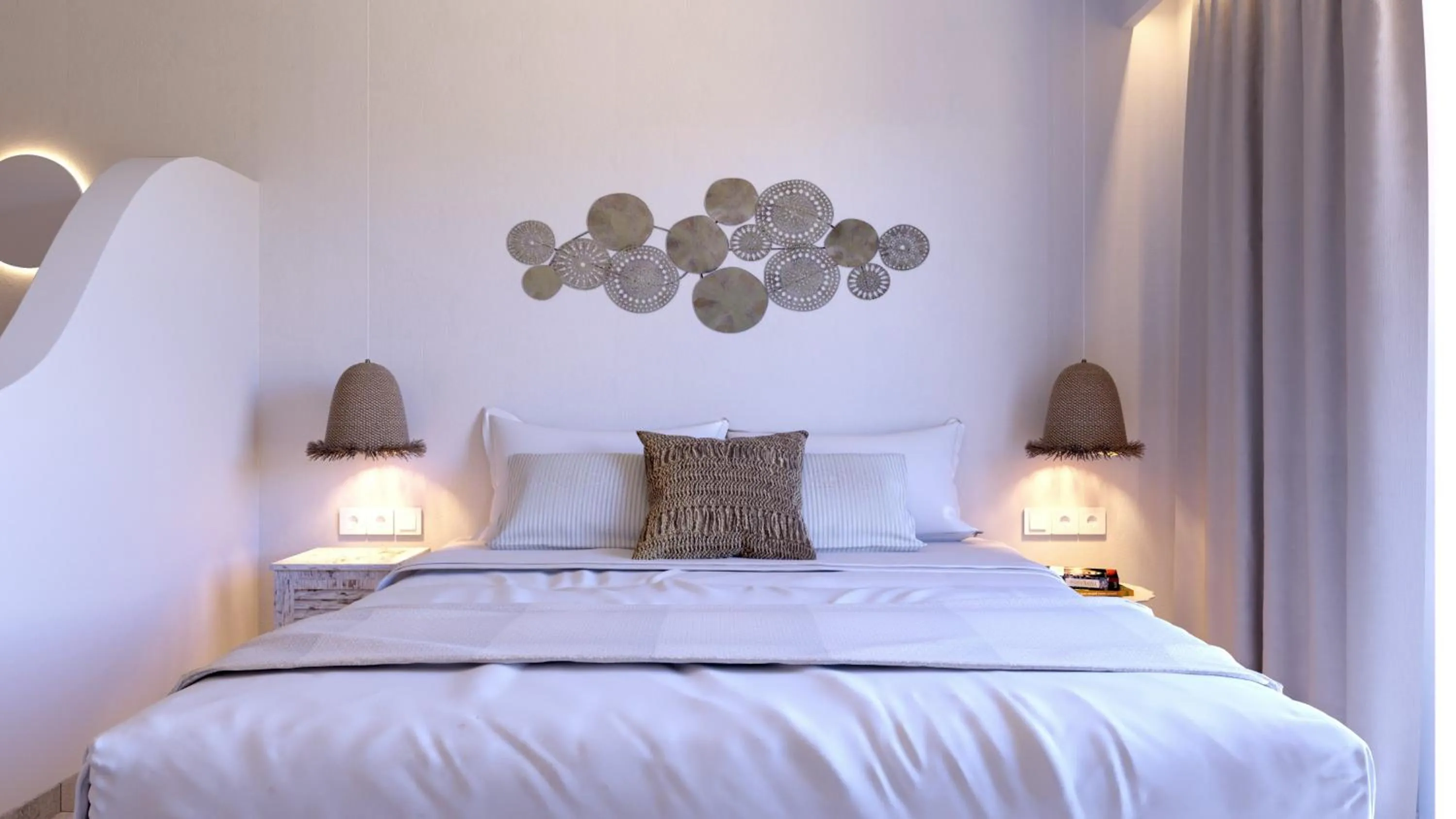 Bed in 'Lindian Myth' Sea View Studios