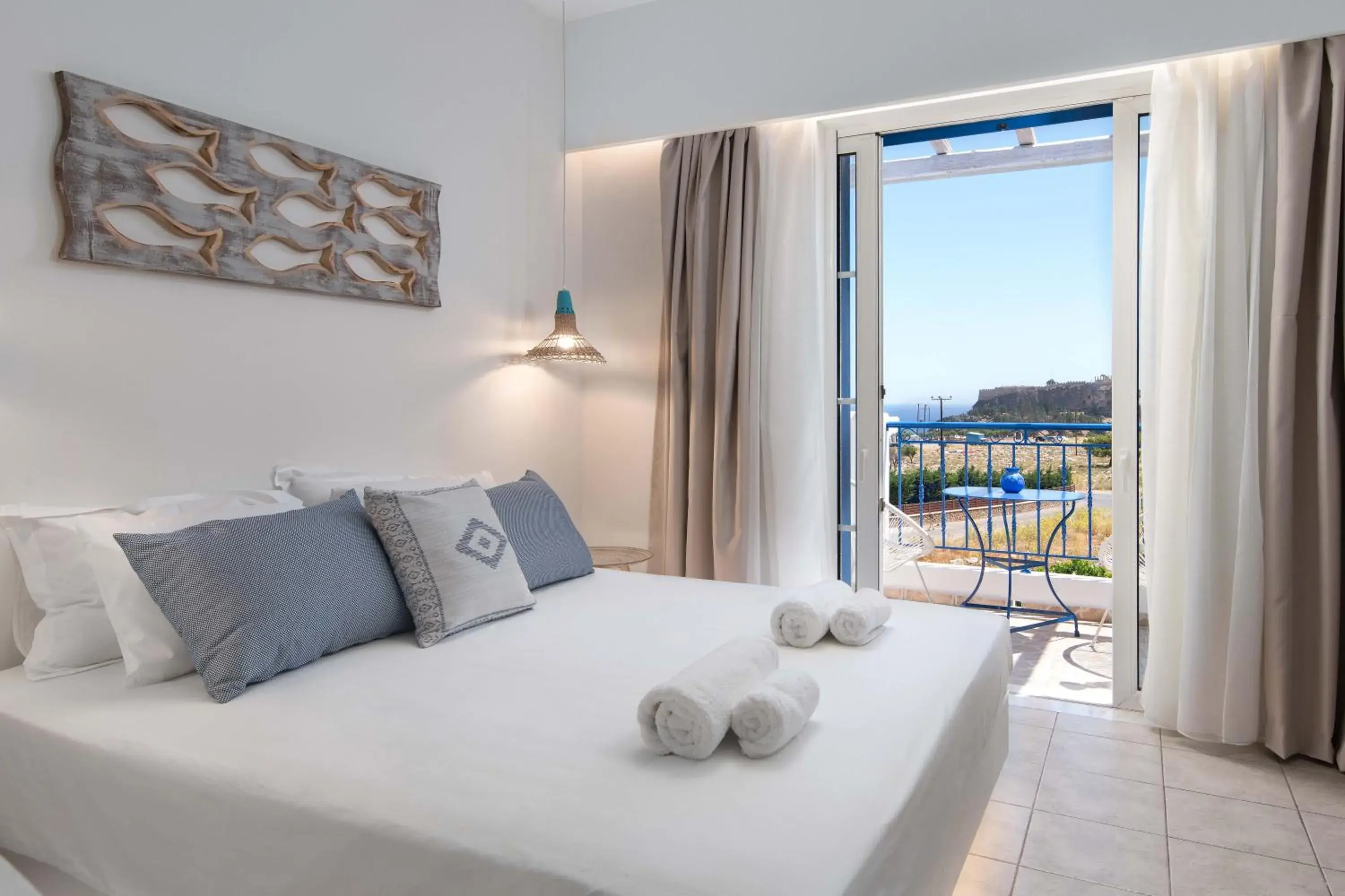 Bed in 'Lindian Myth' Sea View Studios Bed in 'Lindian Myth' Sea View Studios