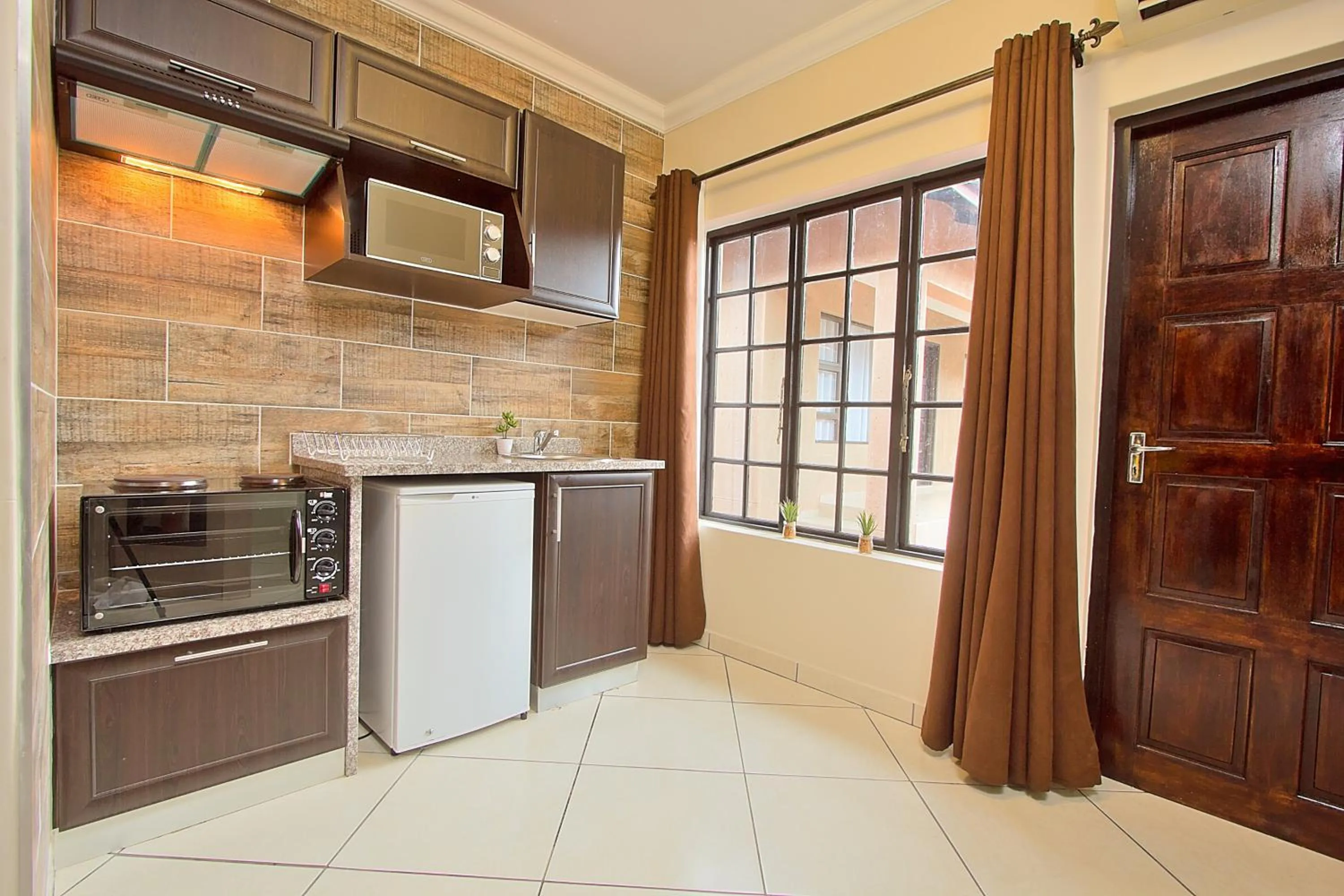 Kitchen or kitchenette in Gecko Inn