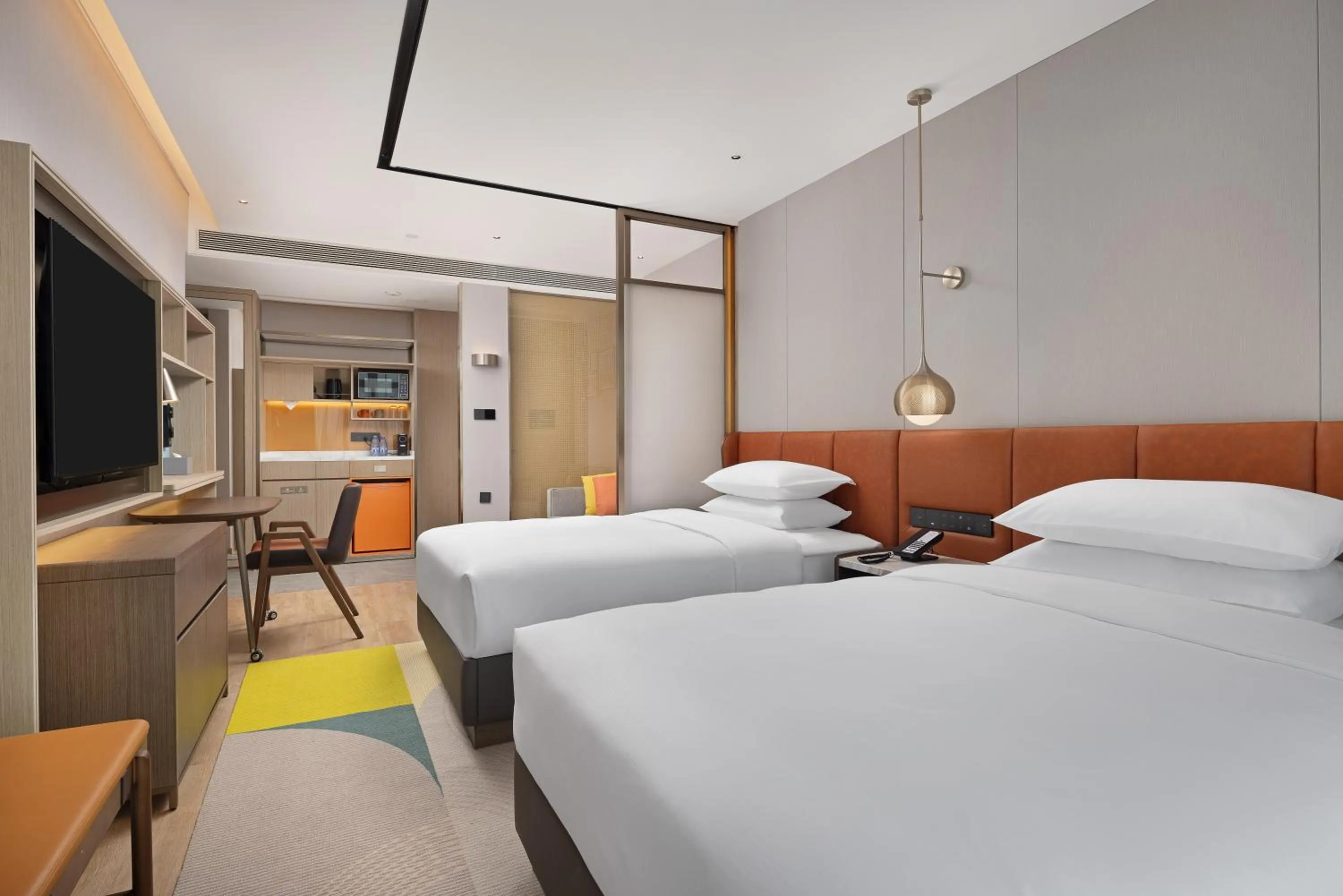 Bed in Home2 Suite by Hilton Hengyang Zhenxiang