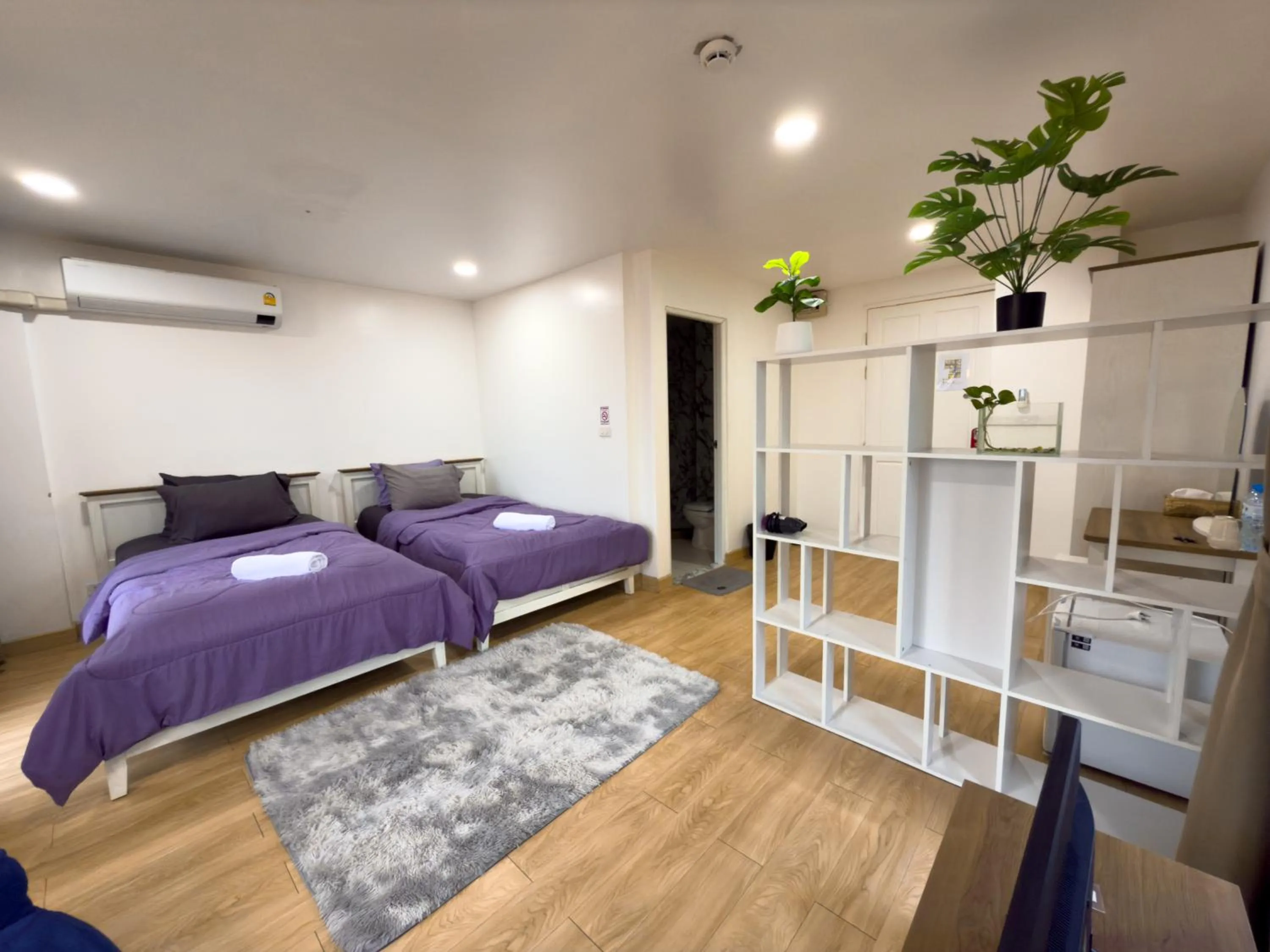 Bed in Breezewood Bangkok Hotel