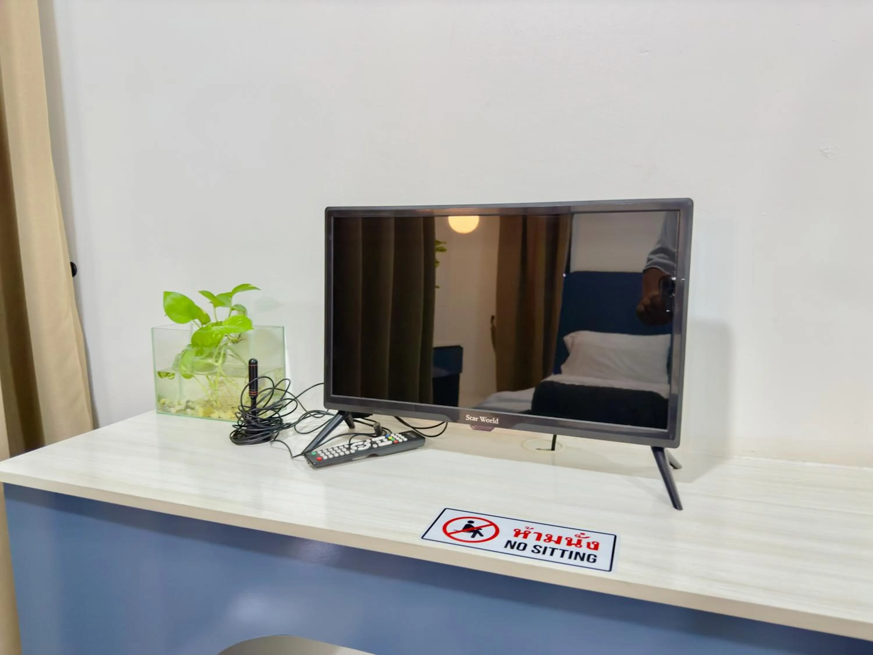 TV and multimedia in Breezewood Bangkok Hotel