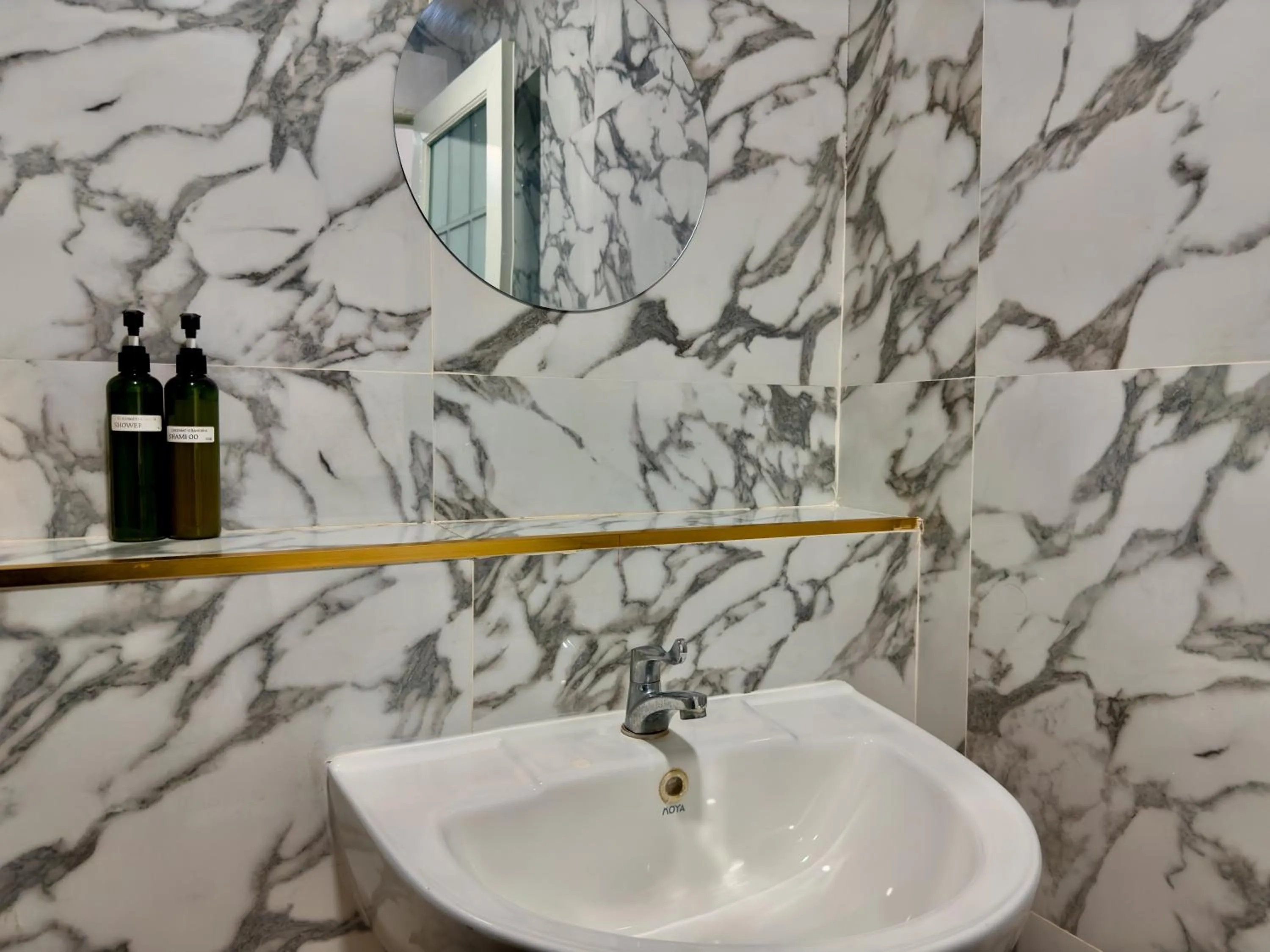 Bathroom in Breezewood Bangkok Hotel