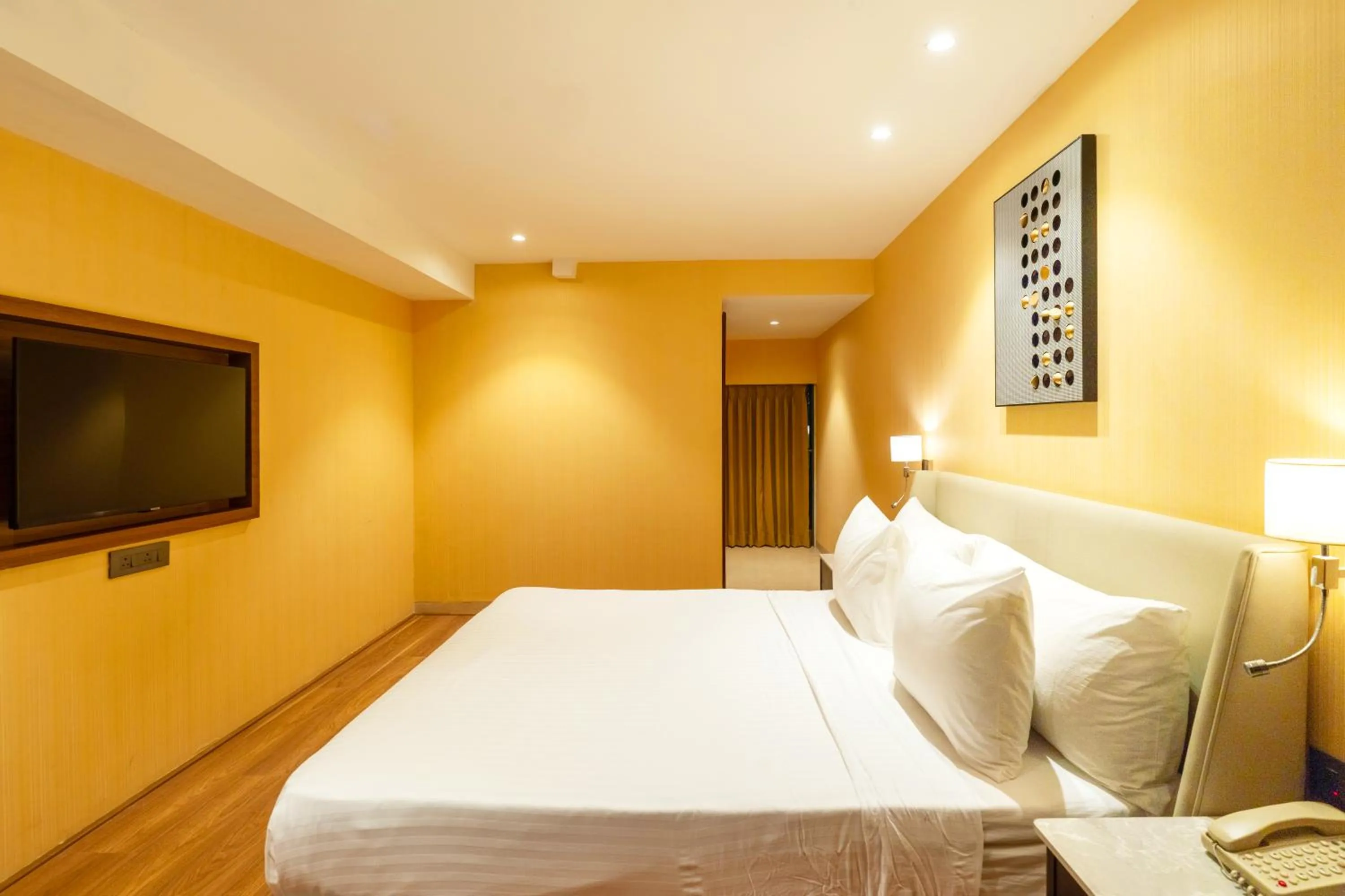 Bedroom, Bed in Clarks Inn Suites Hyderabad Airport
