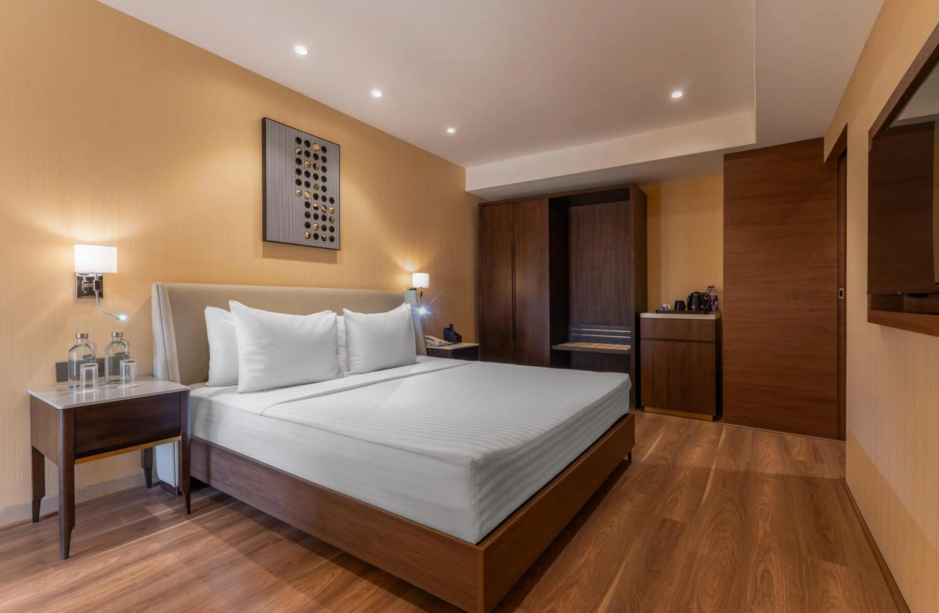 Bathroom, Bed in Clarks Inn Suites Hyderabad Airport