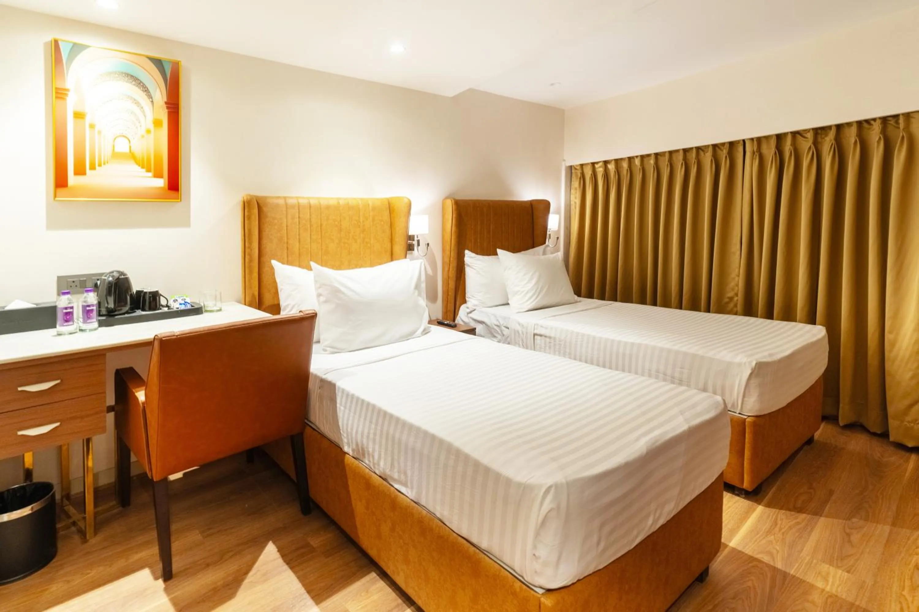 Bedroom, Bed in Clarks Inn Suites Hyderabad Airport