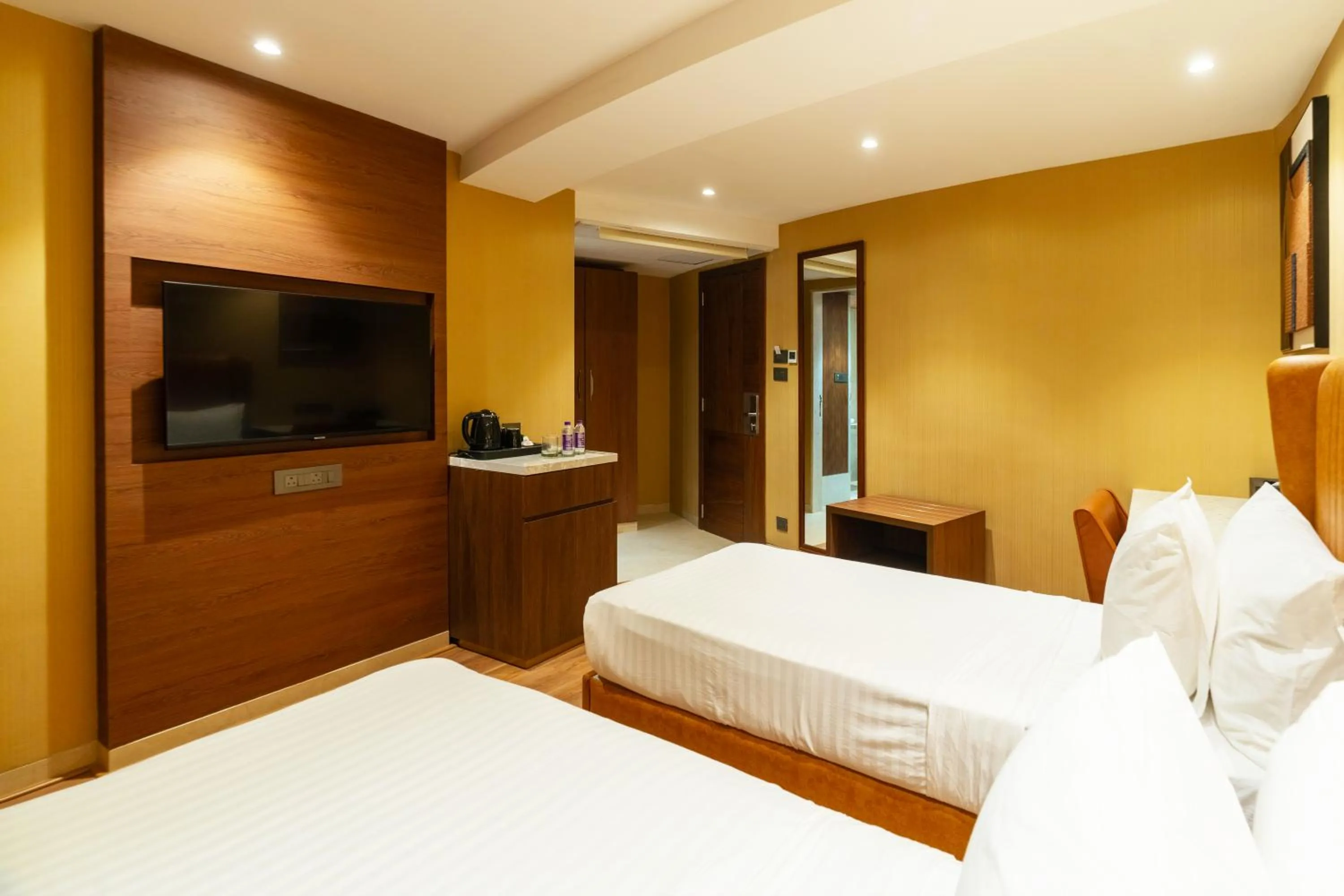 Bedroom, Bed in Clarks Inn Suites Hyderabad Airport
