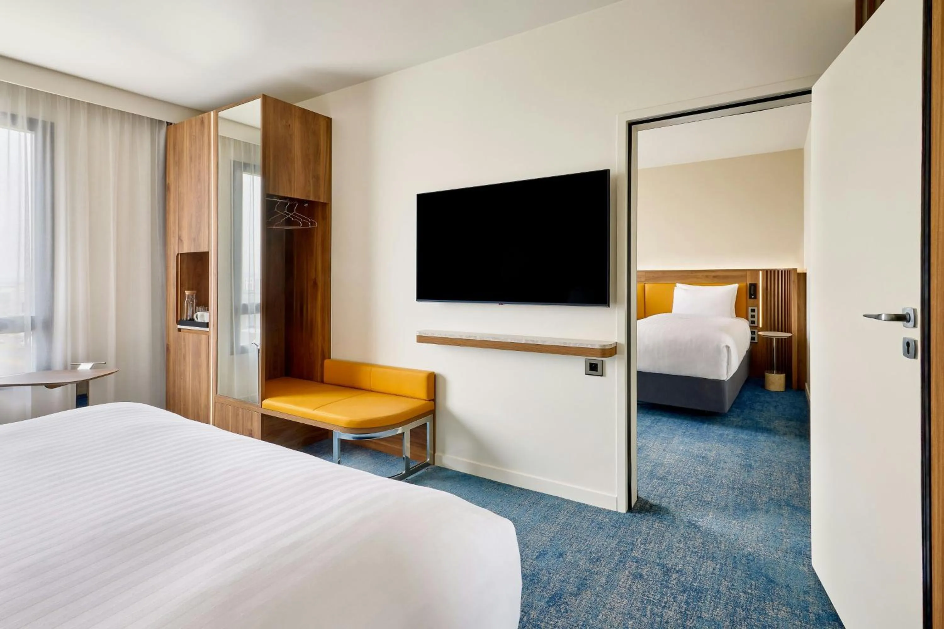 Photo of the whole room, Bed in Courtyard by Marriott Lyon Eurexpo Stadium