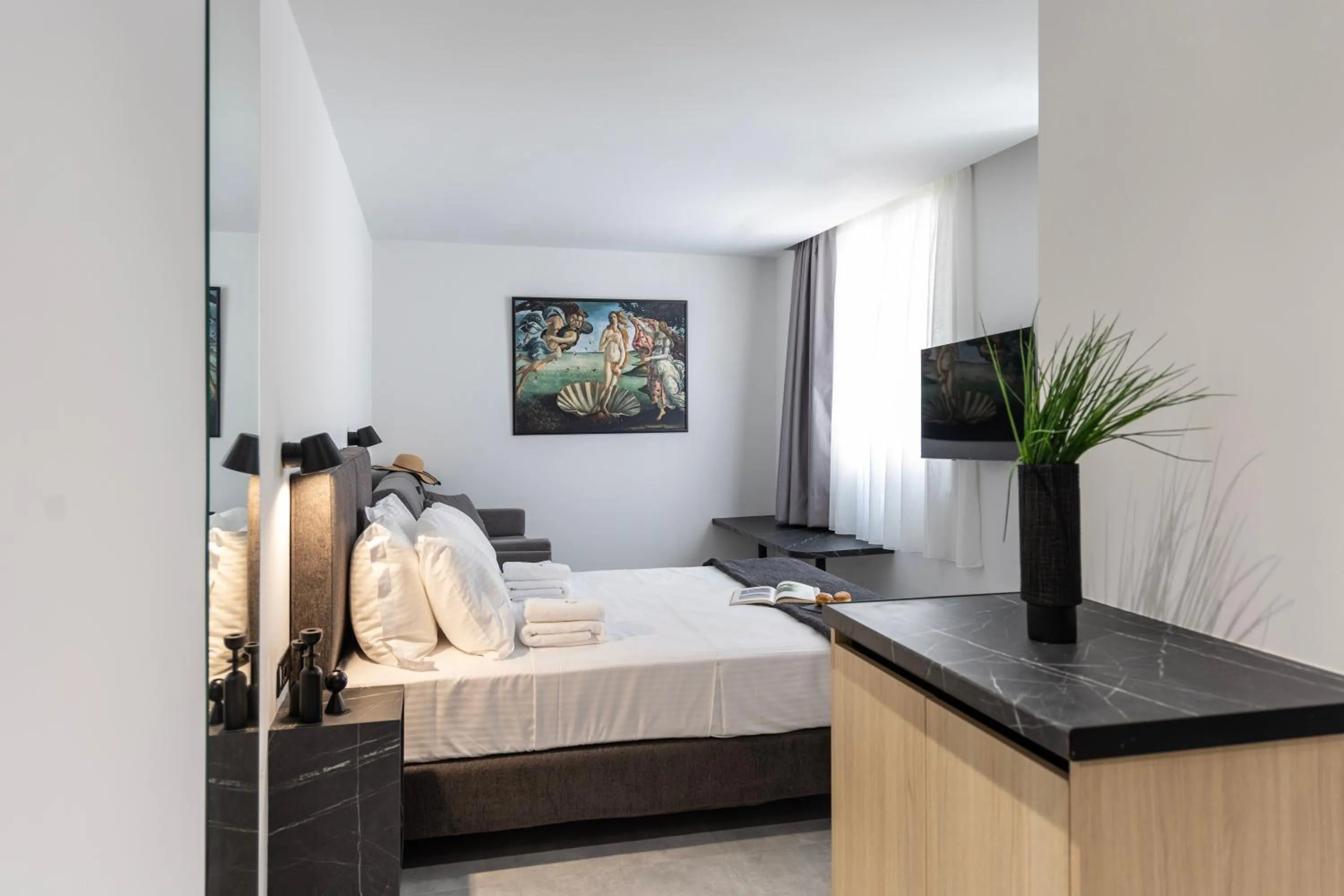 Bed in DOMIOS Suites Athens