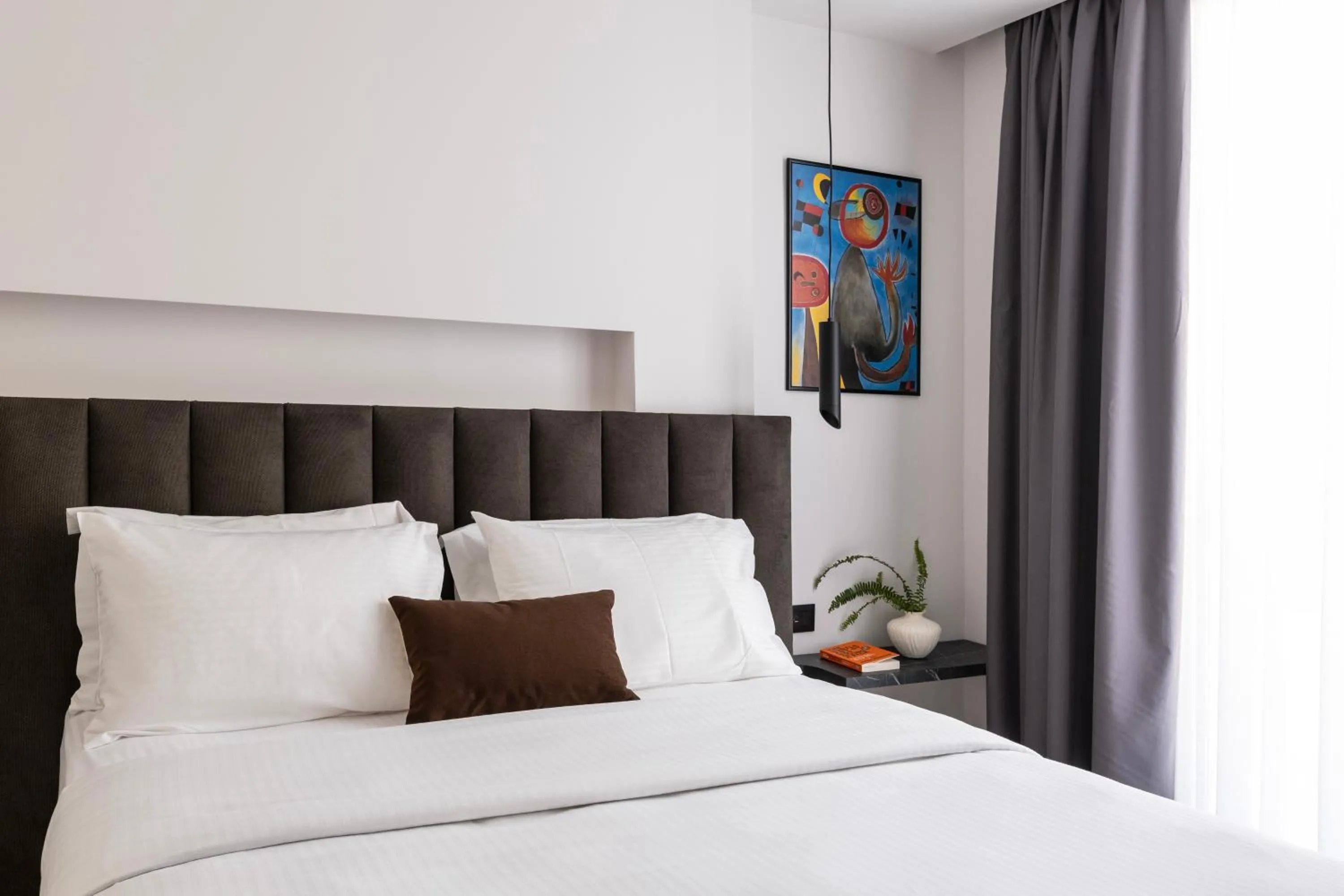 Bed in DOMIOS Suites Athens