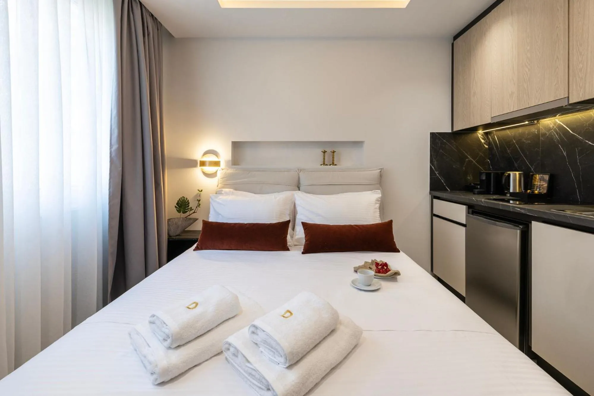 Bed in DOMIOS Suites Athens