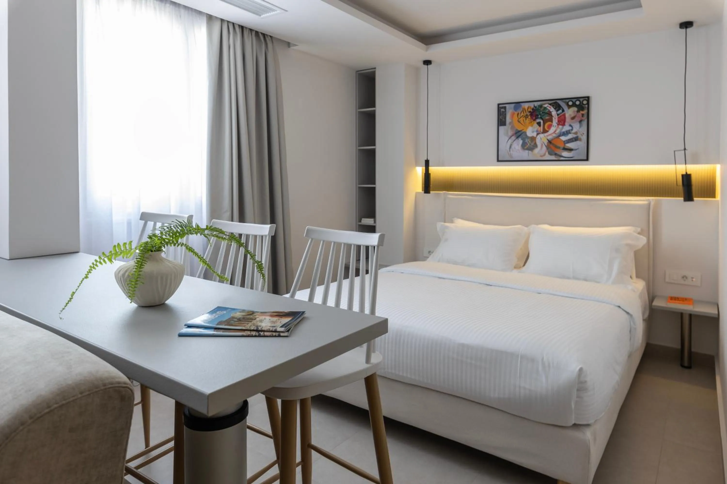 Bed in DOMIOS Suites Athens