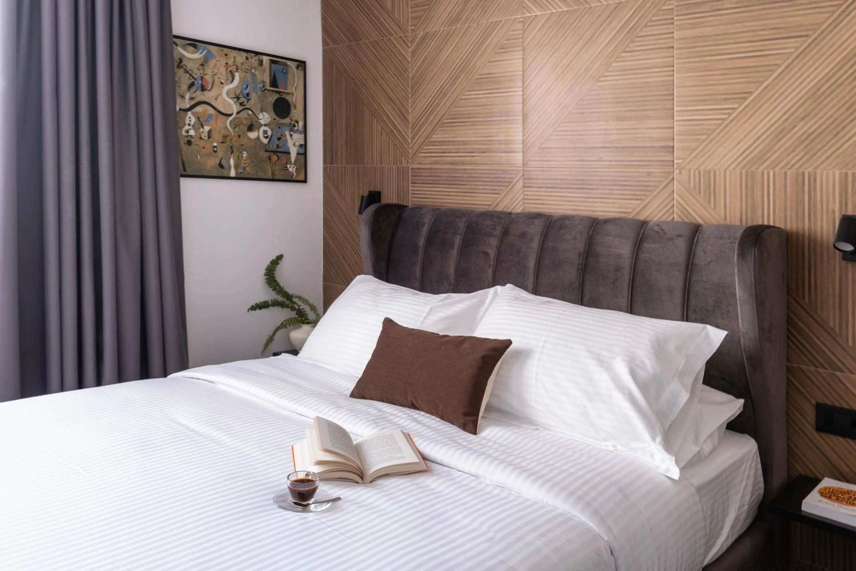 Bed in DOMIOS Suites Athens
