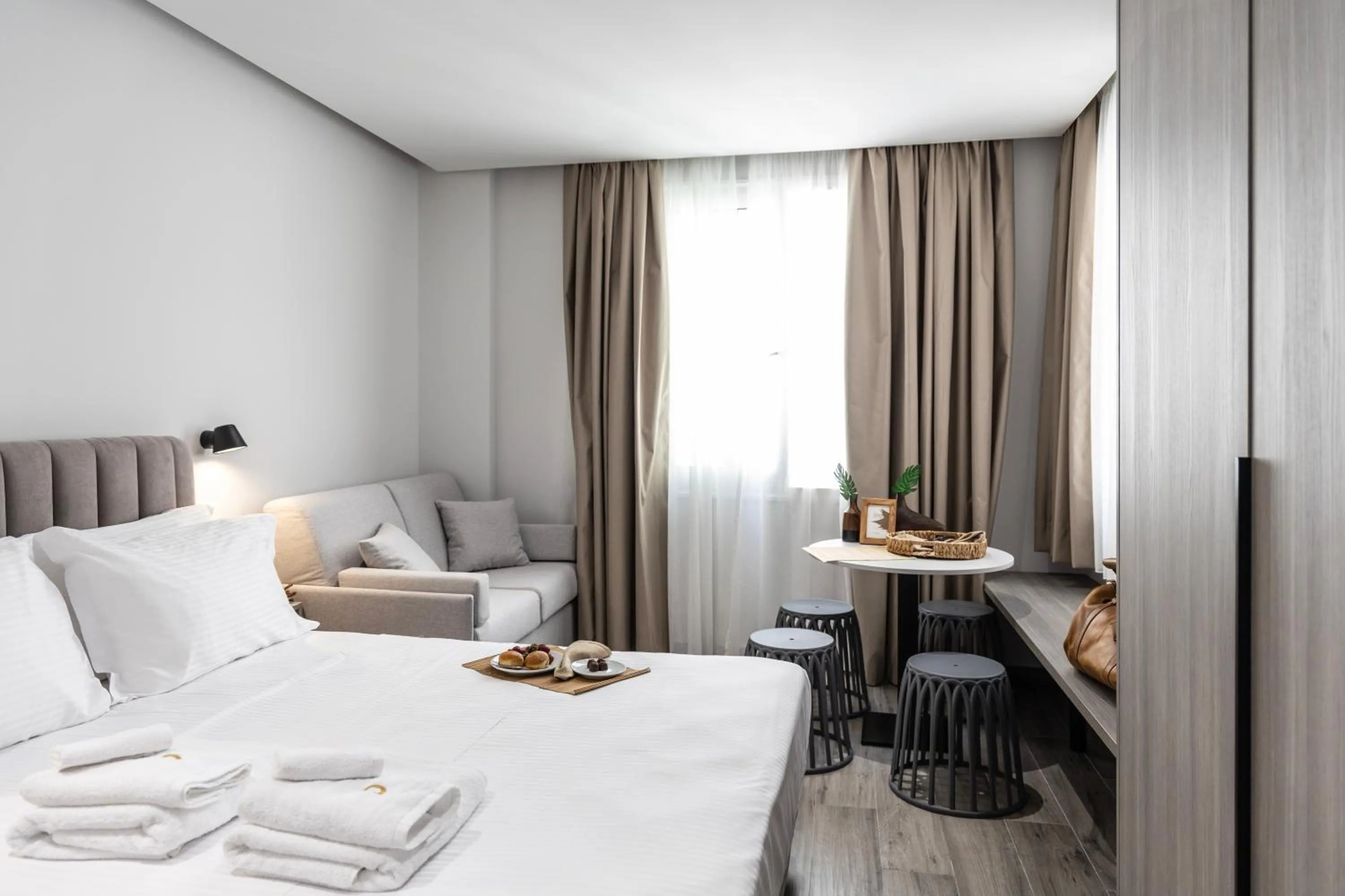 Bed in DOMIOS Suites Athens