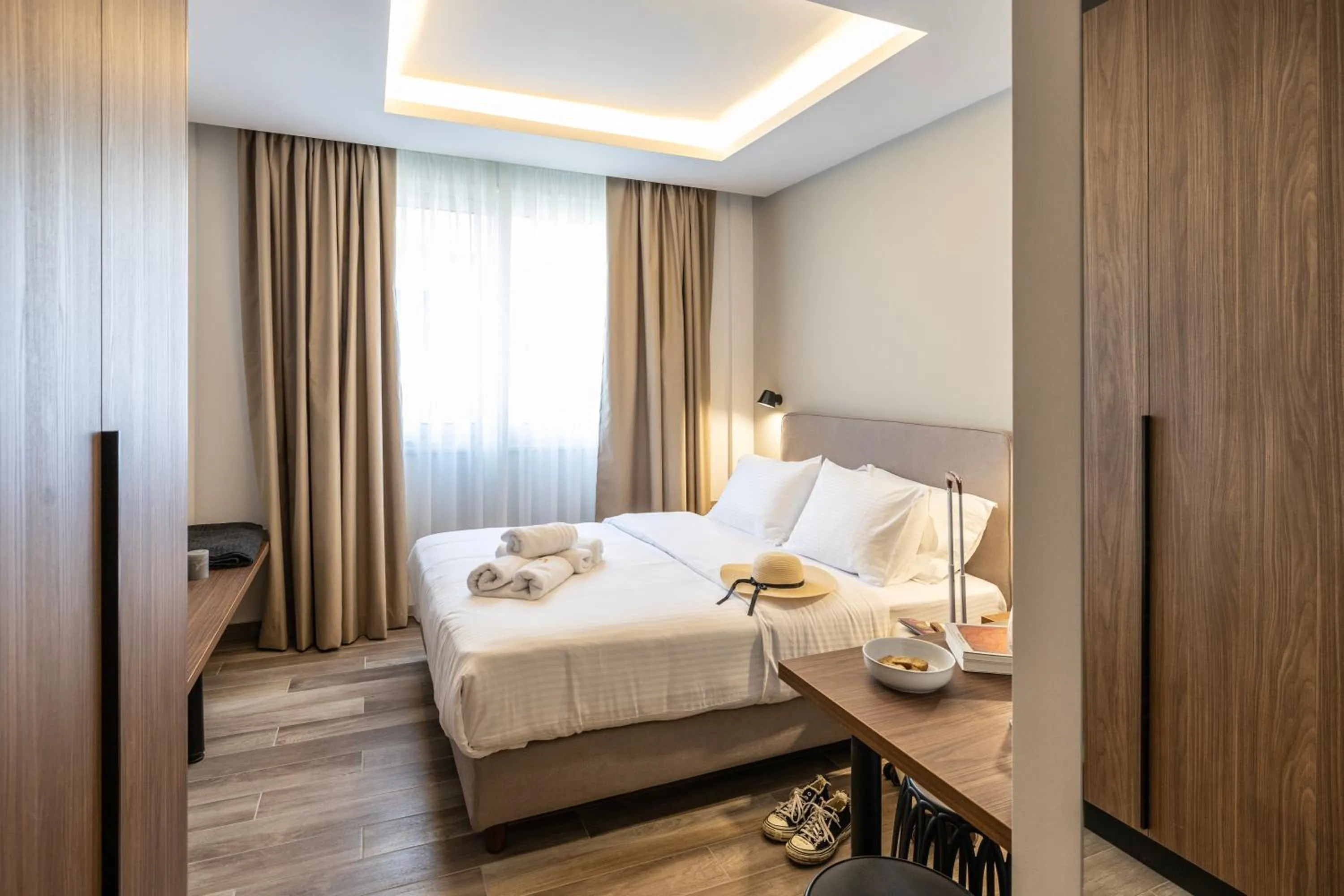 Bed in DOMIOS Suites Athens
