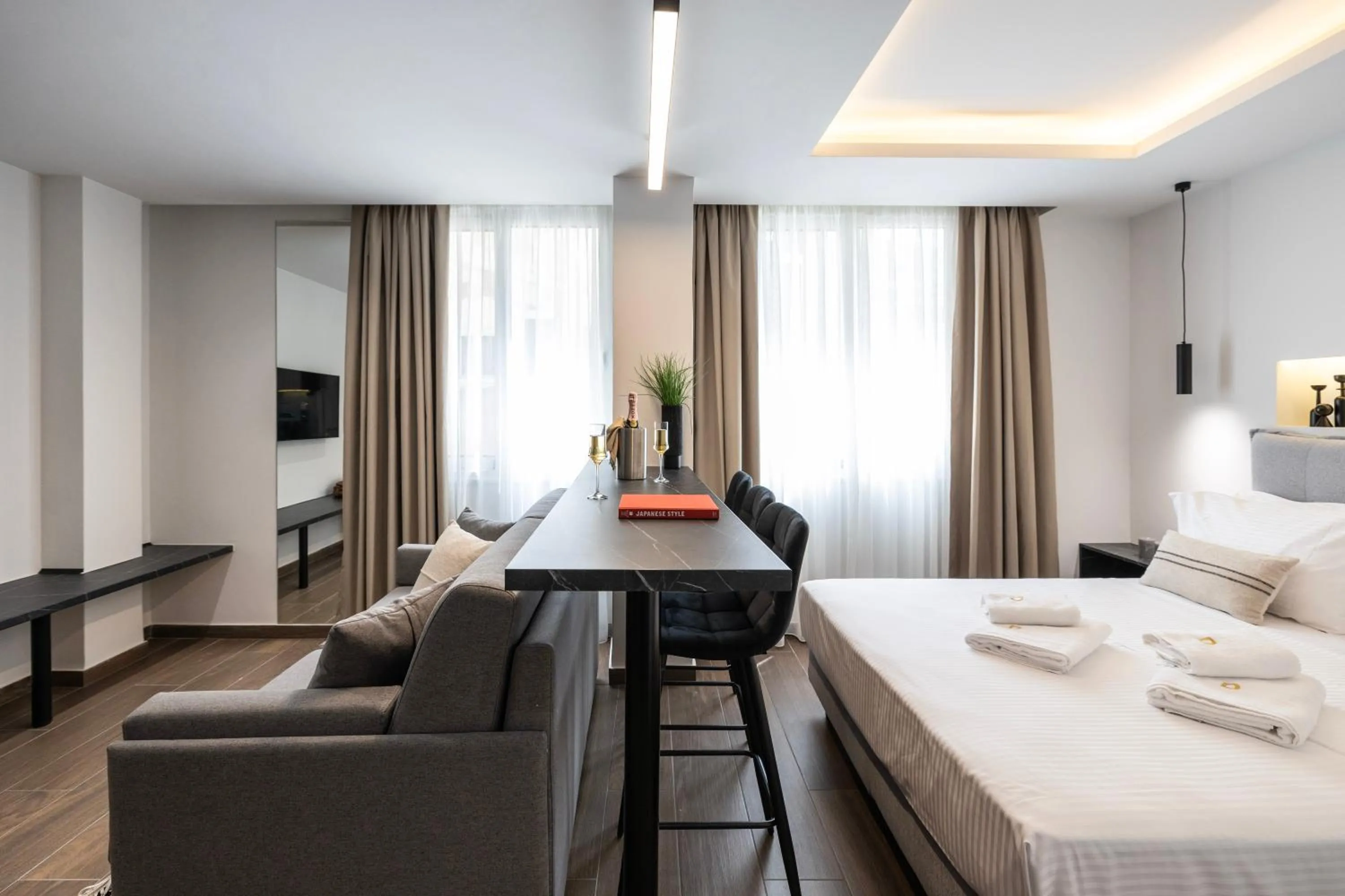 Bed in DOMIOS Suites Athens