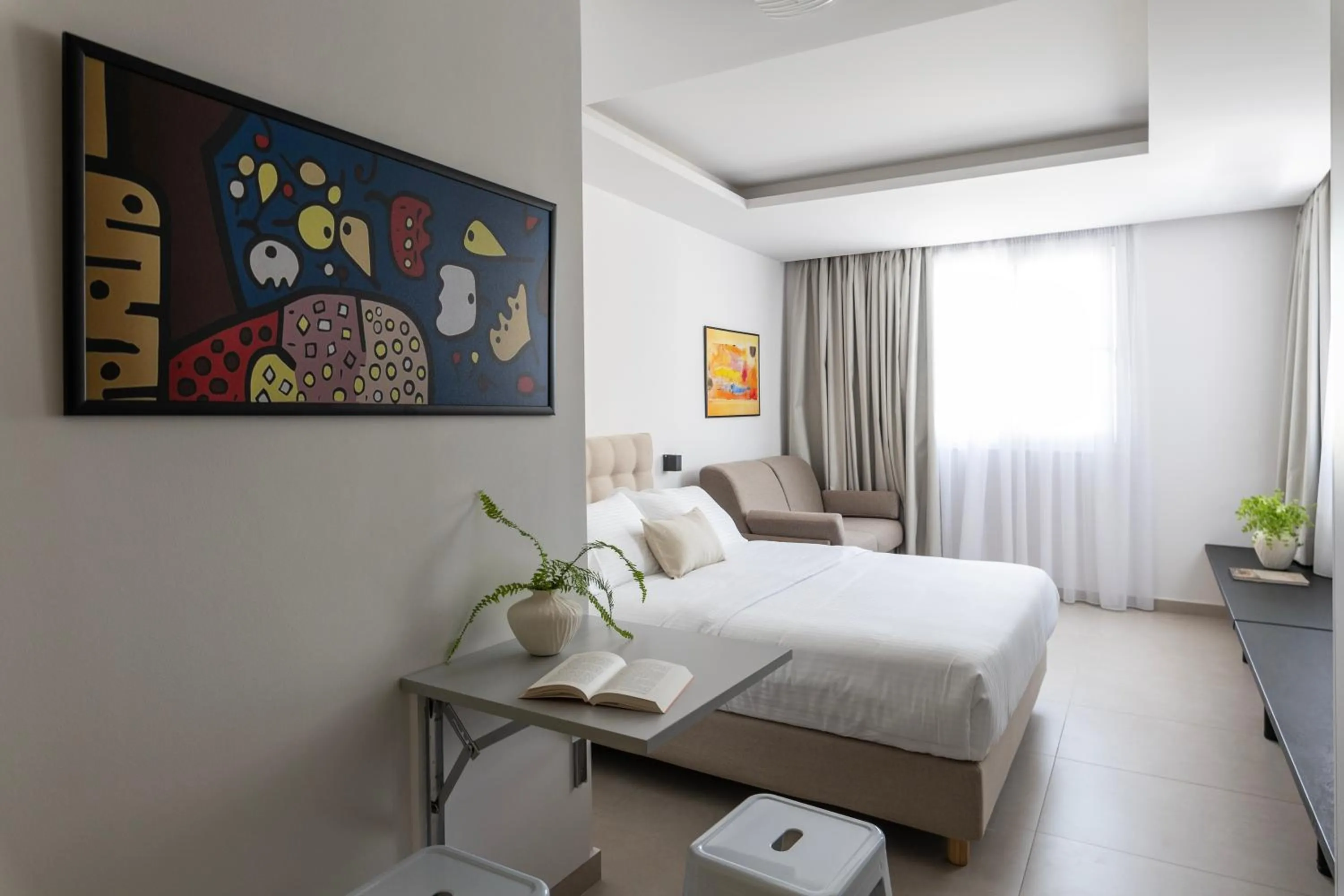 Bed in DOMIOS Suites Athens