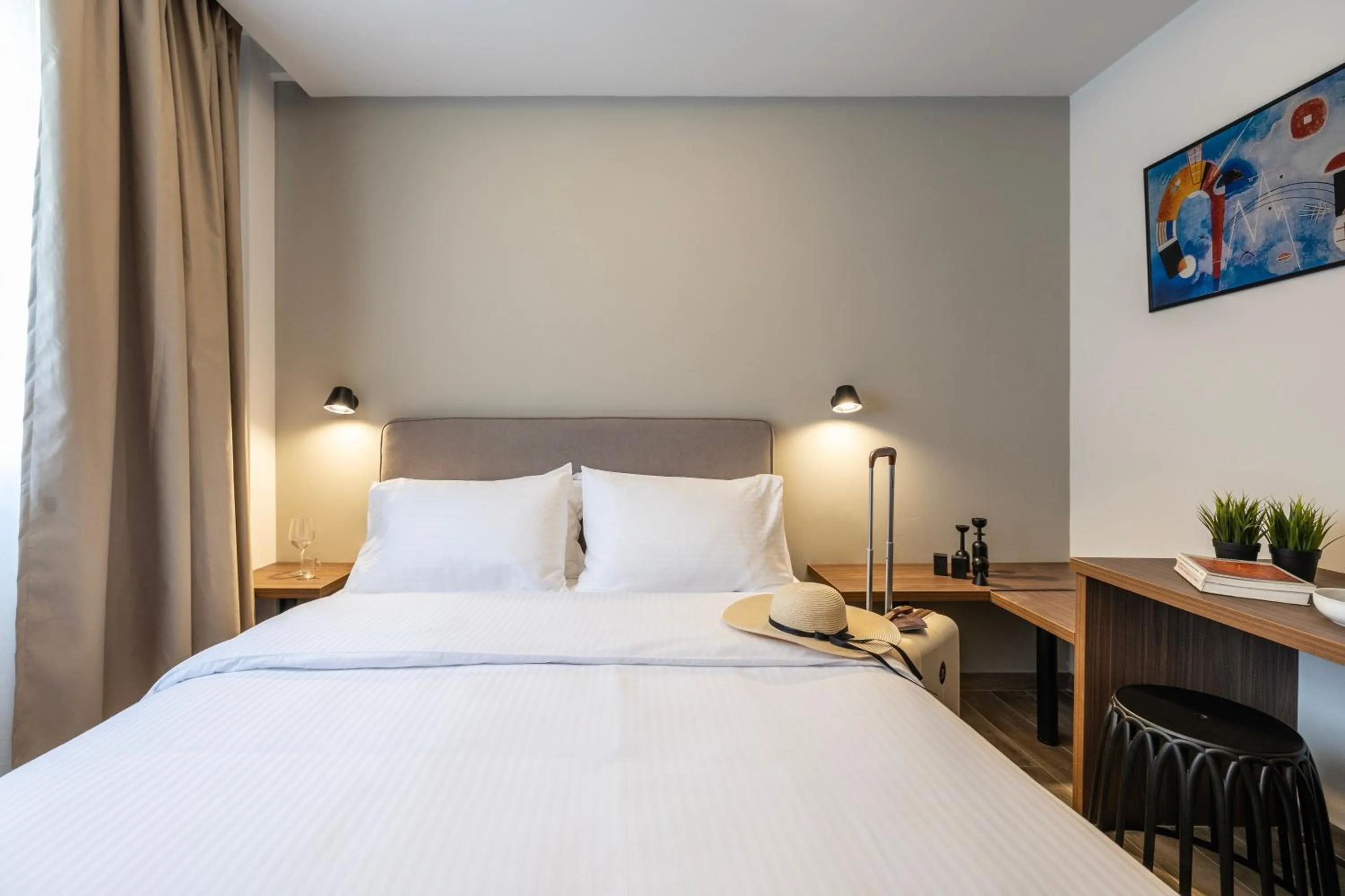 Bed in DOMIOS Suites Athens