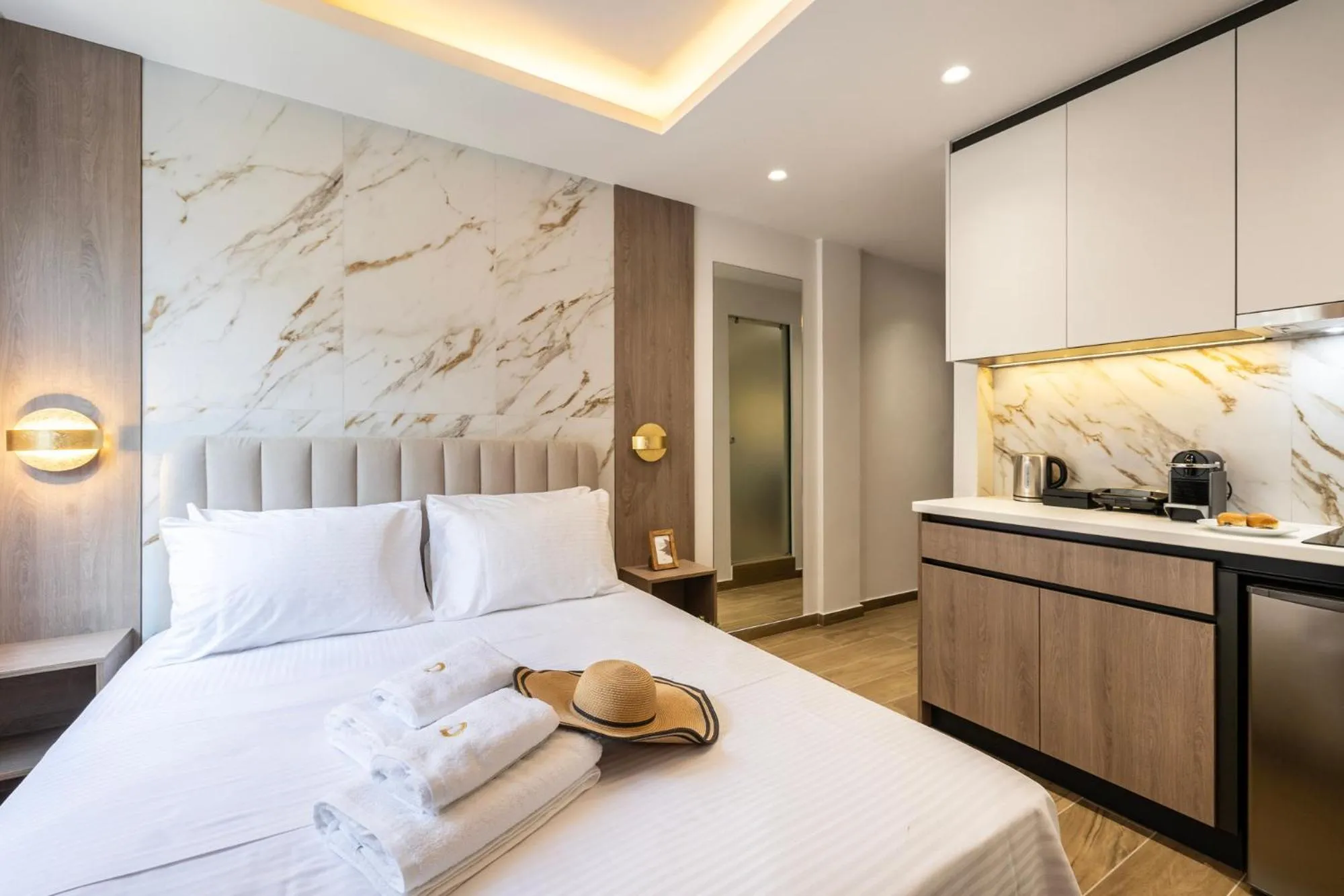 Bed in DOMIOS Suites Athens