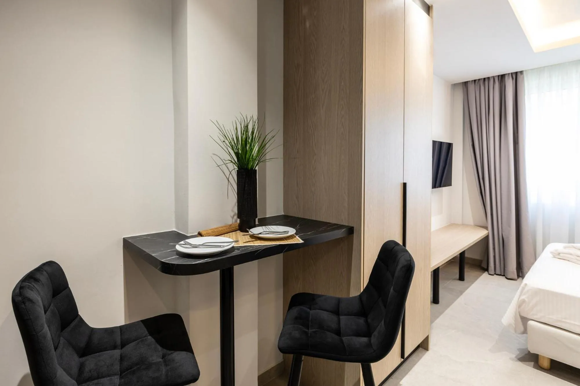 Bed in DOMIOS Suites Athens