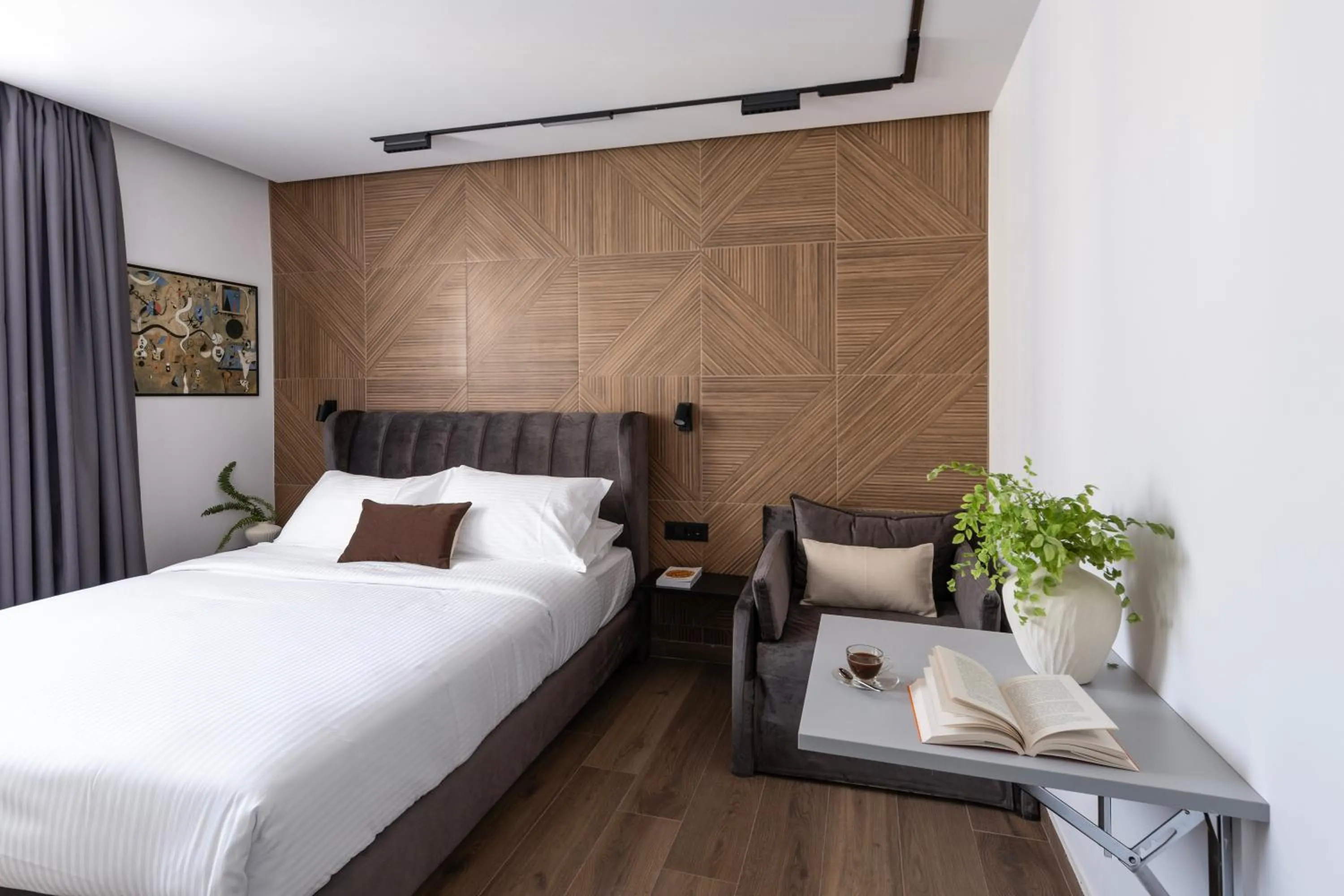 Bed in DOMIOS Suites Athens