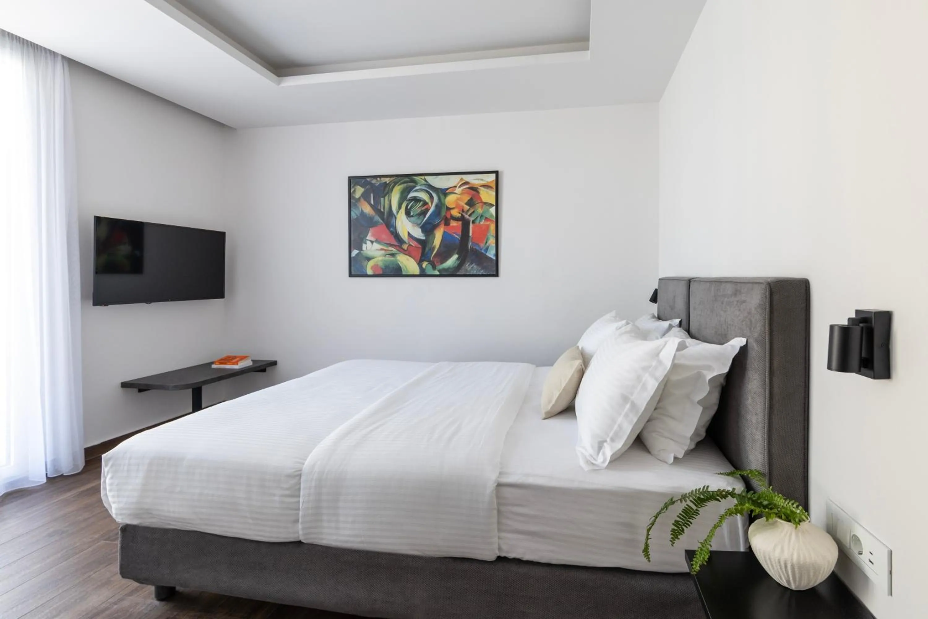 Bed in DOMIOS Suites Athens