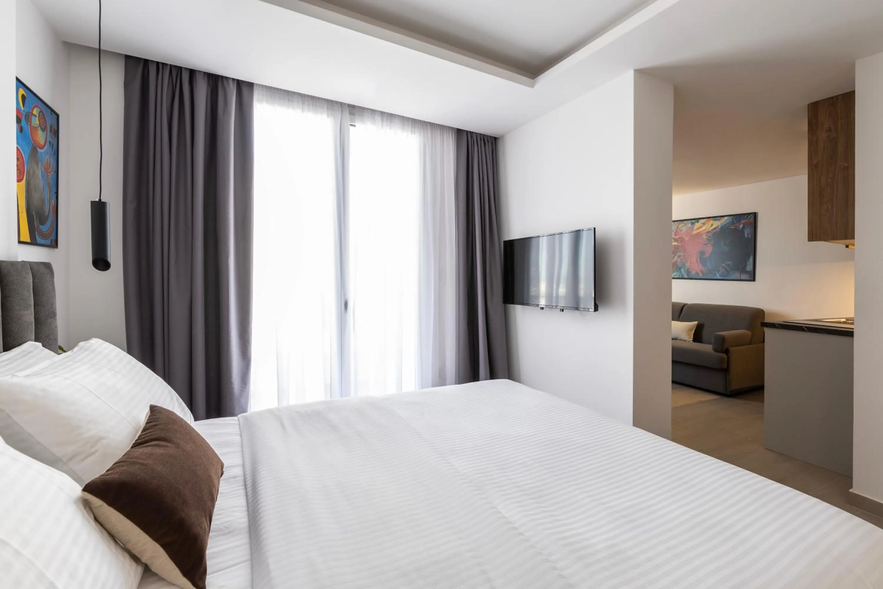 Bed in DOMIOS Suites Athens
