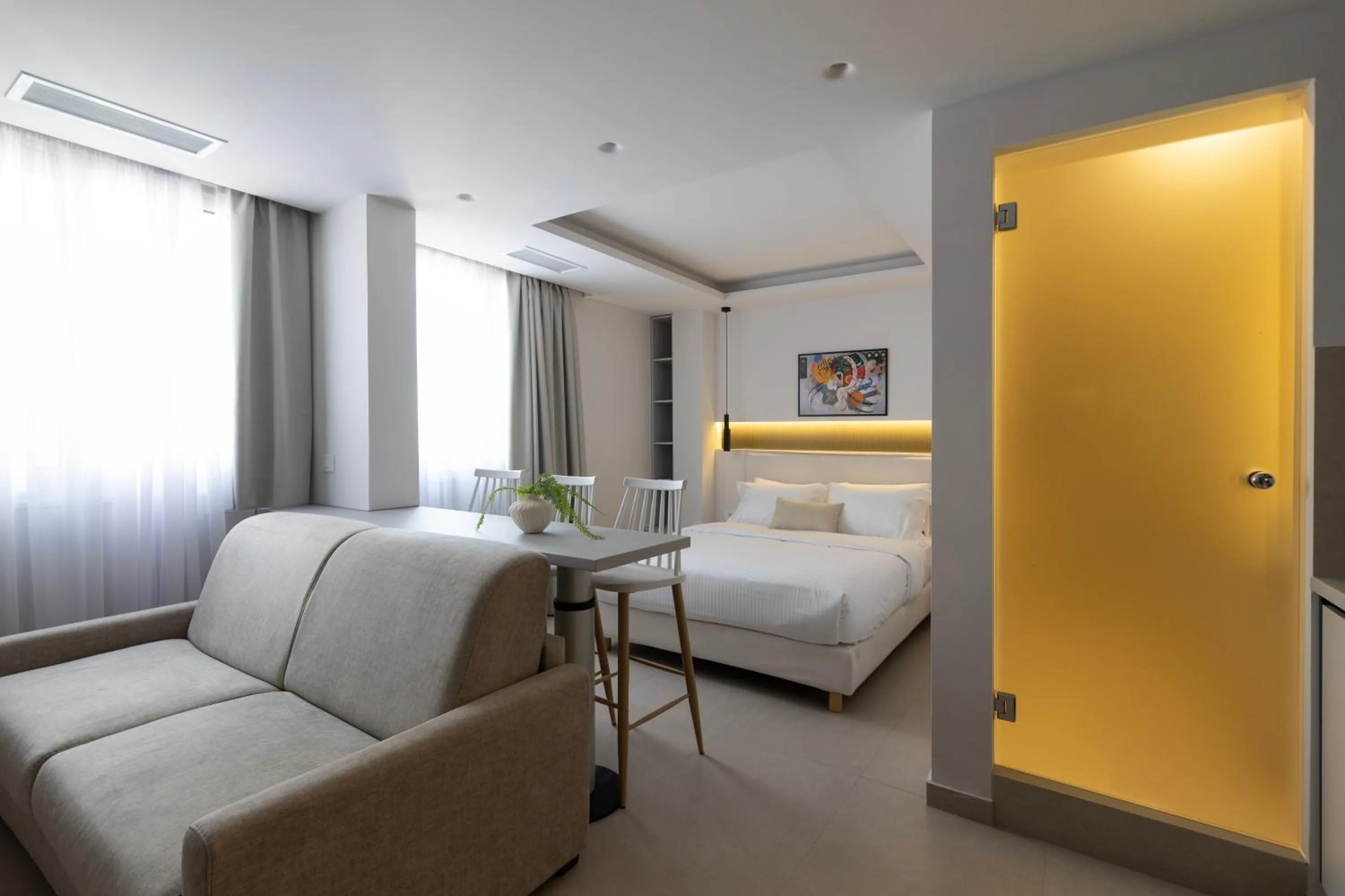 Bed in DOMIOS Suites Athens