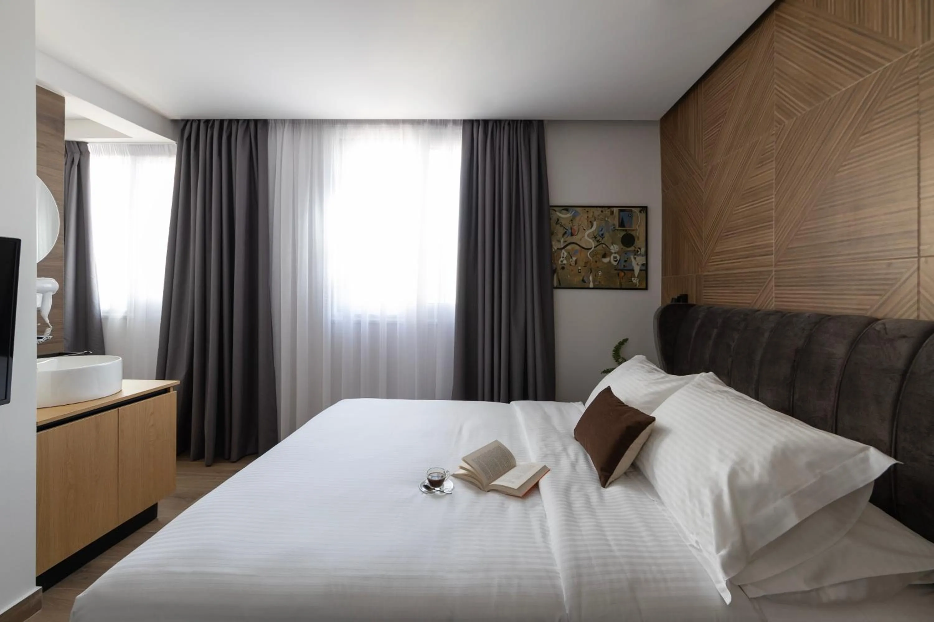 Bed in DOMIOS Suites Athens