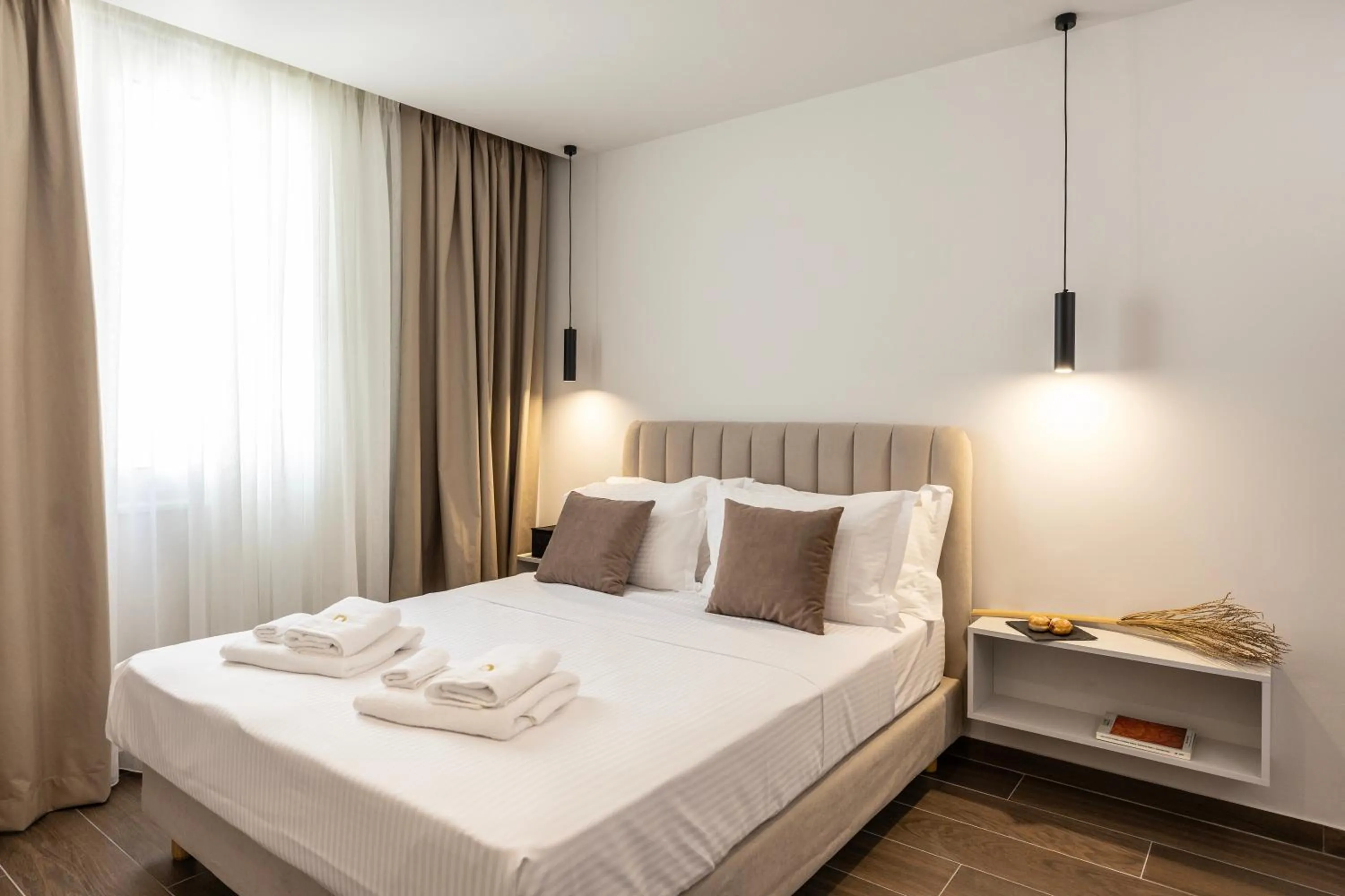 Bed in DOMIOS Suites Athens
