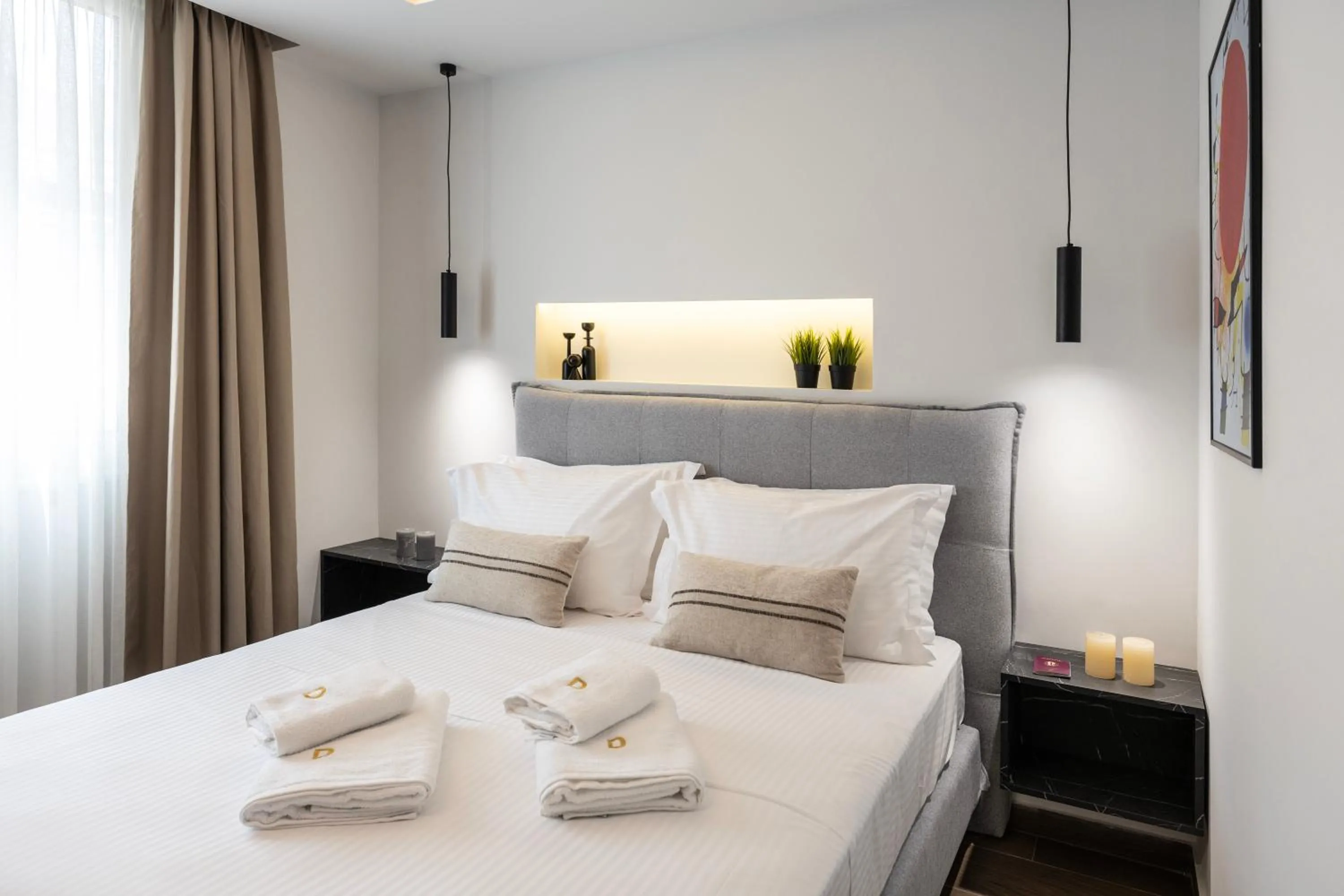 Bed in DOMIOS Suites Athens
