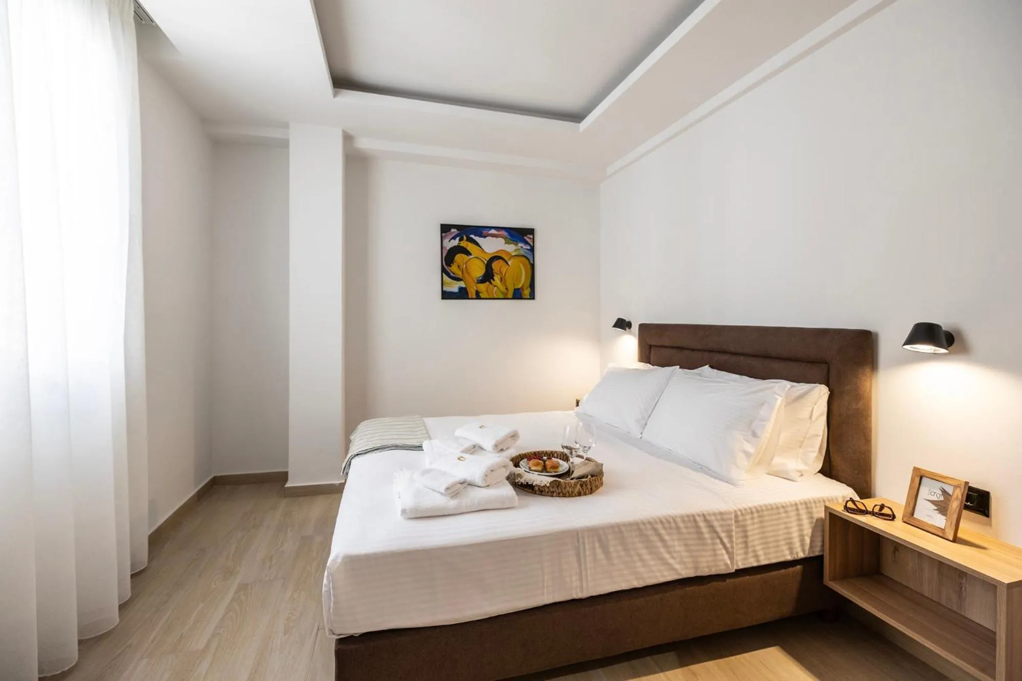 Bed in DOMIOS Suites Athens